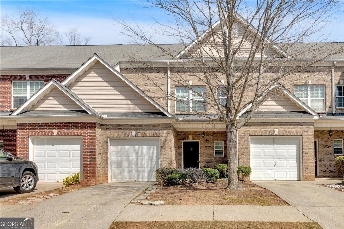 MODERN TOWNHOME IN PREMIER GATED COMMUNITY Discover Your Perfect Atlanta Area Home Welcome to this move-in ready townhome where style meets convenience in a prime location. This thoughtfully designed residence offers the perfect blend of luxury and functionality for today's discerning buyer. Step inside to find an open-concept floor plan bathed in natural light with fresh paint throughout. The kitchen boasts ample cabinetry and generous counter space perfect for entertaining or everyday meal preparation. Retreat to spacious bedrooms, each featuring private en-suite bathrooms for ultimate comfort and privacy. An additional half bath on the main level adds convenience for you and your guests. Outside, enjoy your private backyard oasis with a large patio-ideal for morning coffee, evening relaxation, or weekend gatherings. And don't forget to park your car in your own private garage. Freshly painted throughout and LVP flooring throughout all living areas and bedrooms. Community & Location Highlights: Secure gated community with HOA amenities including community pool Well-maintained neighborhood with sidewalks and street lighting Convenient access to MARTA for stress-free commuting Just 12 minutes from Hartsfield-Jackson International Airport 15-minute drive to the Atlanta State Farmers Market (150 acres of local produce, meats, cheeses, and more) 25 minutes to vibrant downtown Atlanta Proximity to excellent schools, shopping centers, and local dining This exceptional townhome offers the perfect combination of metropolitan convenience and residential tranquility. Schedule your showing today!