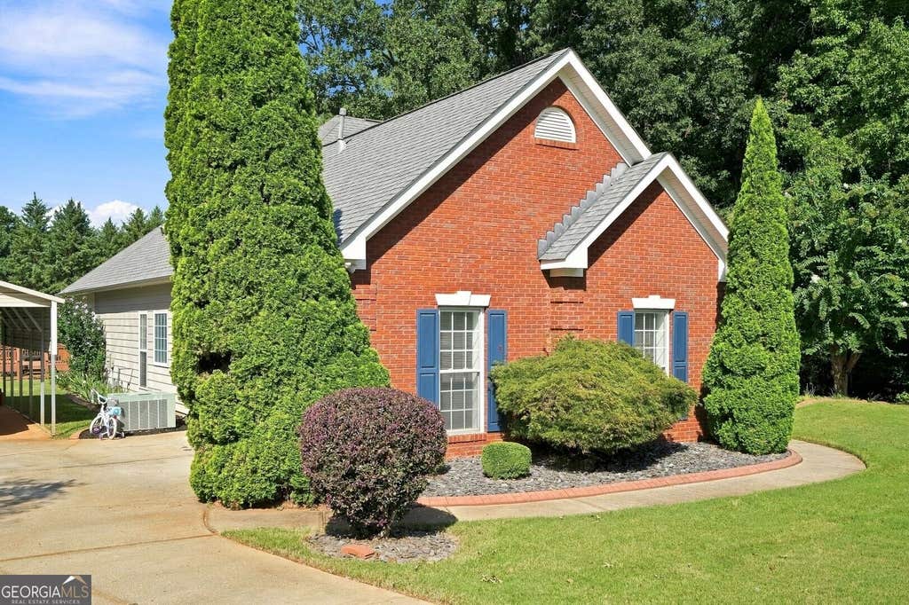 Photo of 1203 Foxcreek Drive, McDonough, GA 30252 (MLS # 10831058)