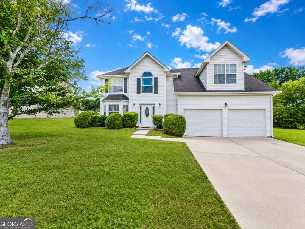 Photo of 6049 Hitt Lake Trail, Stone Mountain, GA 30087 (MLS # 10810659)