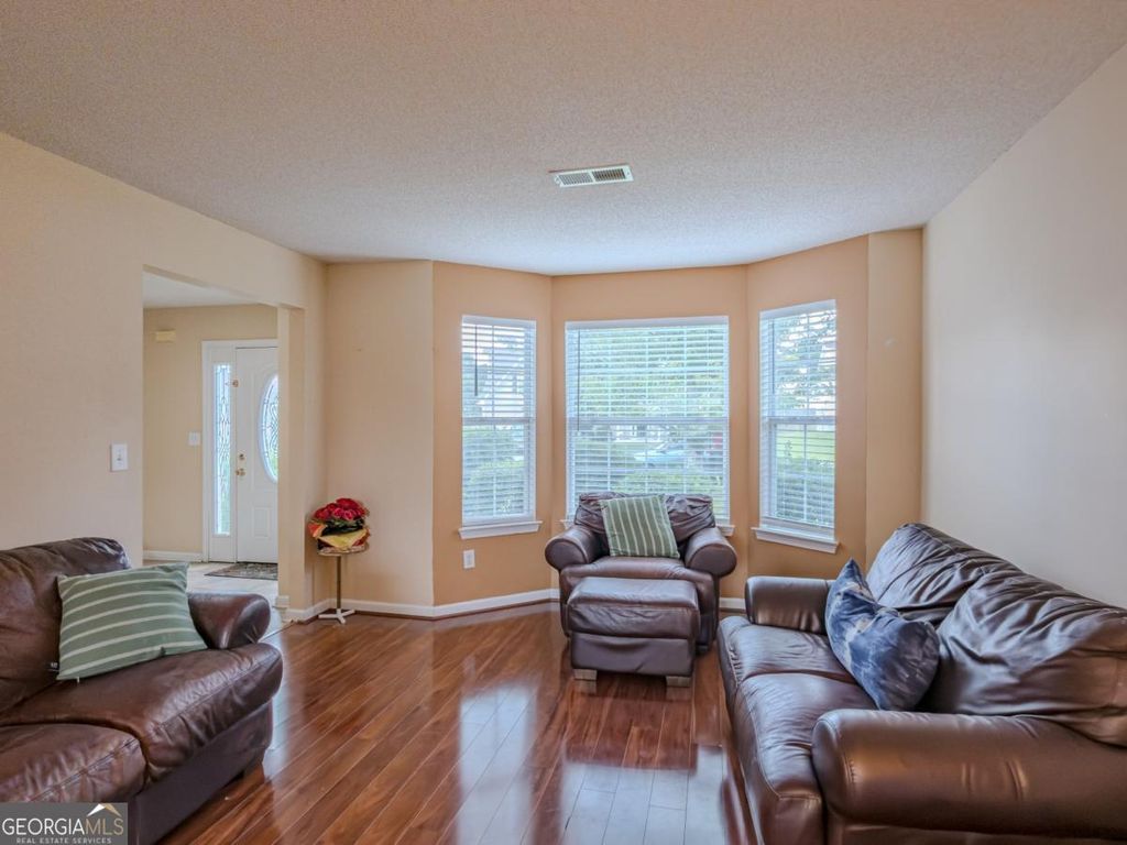 Photo of 6049 Hitt Lake Trail, Stone Mountain, GA 30087 (MLS # 10810659)