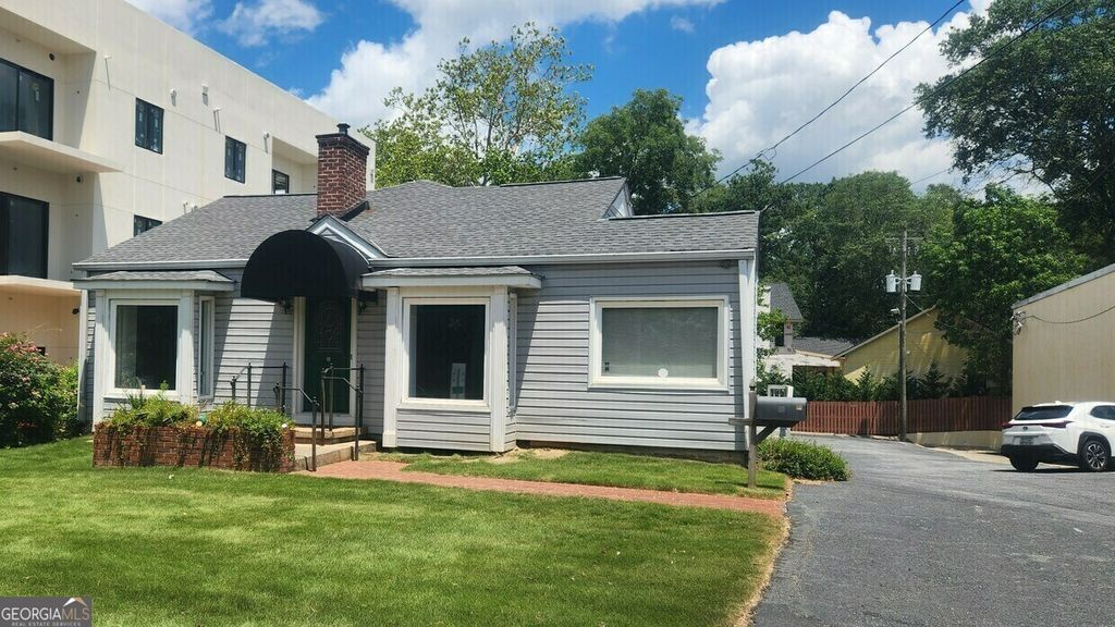 Photo of 326 Sandy Springs Circle, Atlanta, GA 30328 (MLS # 10692561)