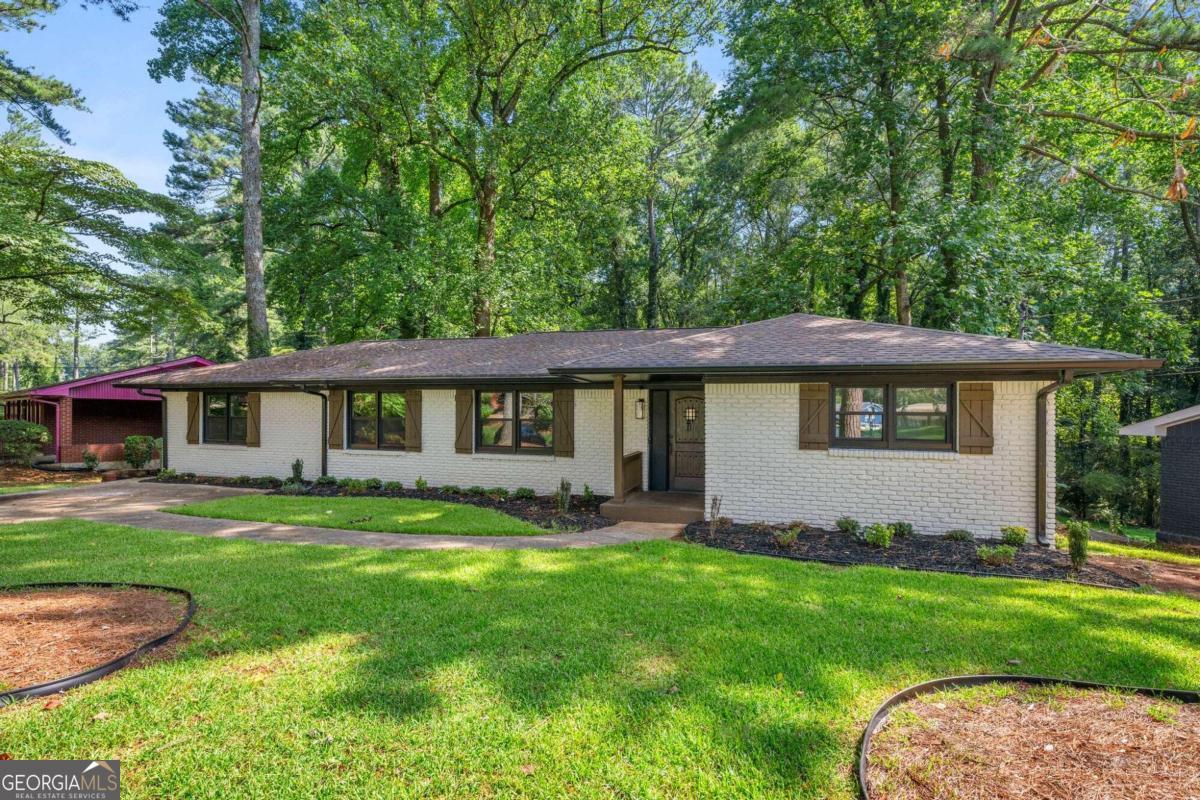 Welcome to a beautifully renovated gem located in the heart of Atlanta! This stunning 3-bedroom, 3-bathroom home offers the perfect blend of modern design and comfortable living, all within a meticulously crafted space.    This home has been fully renovated with attention to every detail, featuring new flooring, updated electrical and plumbing, fresh paint, and modern finishes throughout.    The open-concept living and dining area provides ample space for entertaining and family gatherings, with large windows allowing natural light to flood the space.     The chef's kitchen boasts brand-new stainless steel appliances, granite countertops, a large island, and plenty of cabinet space for all your storage needs.    Need a home office, playroom, or extra living space? This home includes an open space that can be customized to suit your needs, offering versatility and convenience. The master bedroom is a true retreat, featuring a spacious layout, a walk-in closet, and a private en-suite bathroom with a double vanity and a beautifully tiled shower.    The additional bedrooms are generously sized with easy access to two full bathrooms, making it perfect for guests or family members.    Enjoy your morning coffee or host a summer BBQ in the large, private backyardCoideal for outdoor living and entertaining.    Located in this desirable neighborhood, this home is just minutes away from parks, shopping, dining, and easy access to major highways, making your commute a breeze.        There is no HOA, so this property will make an amazing investment property.     DonCOt miss the opportunity to own this fully renovated, move-in ready home. Make this your first or forever home today!  in one of AtlantaCOs most sought-after neighborhoods. Schedule your private showing today!        Preferred lender offering $4K towards your total cash to close and low interest rates!