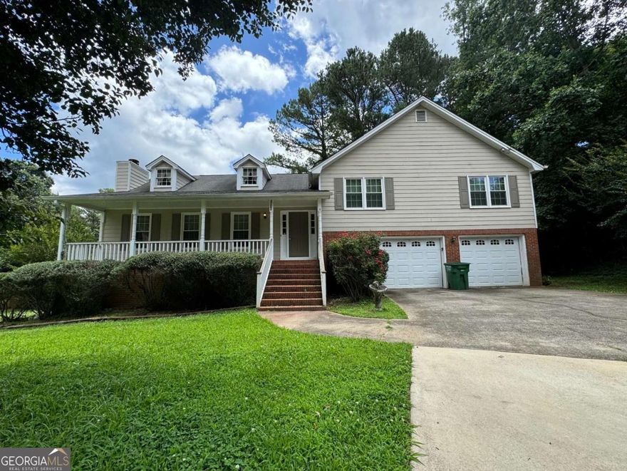 Make a great deal even better with massive savings through special loan programs with the Preferred Lender Envoy Mortgage with Aubrey Wilcox! Ask the Listing Team for the introduction for up to 100% Financing or even interest rates in the 4s! Welcome to 2936 Highland Park Drive-a spacious and inviting split-level home nestled in the established Carriage Park community of Stone Mountain. With 3 bedrooms, 2.5 bathrooms, and a finished basement, this home offers flexible living space perfect for everyday comfort or entertaining guests. Enjoy cozy evenings by the fireplace, relax on the open front porch, or host summer barbecues on the large back deck overlooking a private, wooded backyard on over half an acre. Living in Stone Mountain means being close to one of Georgia's most beloved landmarks-Stone Mountain Park-offering hiking trails, scenic views, lakes, festivals, and year-round recreational activities. The area also provides convenient access to shopping, dining, and local parks, plus major highways like I-285 and US-78 for easy commuting. Whether you're seeking outdoor adventure, everyday convenience, or a peaceful place to call home, this location has it all. Don't miss this opportunity to own a lifestyle home in one of Gwinnett County's most accessible and nature-rich communities!