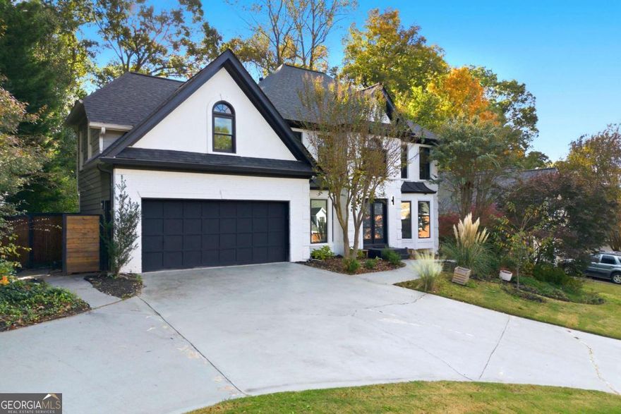 Stunning Executive Home in Highly Sought-After Highland Park!  Nestled in the prestigious Lassiter School District, this beautifully appointed executive home is a true gem. Offering an open, light-filled floor plan, this property is the perfect combination of comfort and sophistication.   The gourmet kitchen with island features newly updated cabinetry, granite countertops, hardwood floors, and two skylights, flooding the space with natural light. The amazing lodge room is the heart of the home, boasting vaulted ceilings with stunning cedar framing, Brazilian hardwood floors, and three walls of windows offering plenty of natural light. The room's wood-burning stone fireplace creates a warm, inviting ambience perfect for those cozy nights in. Completing the first floor are a large family room with fireplace and a separate dining room offering the perfect space for formal gatherings.   Upstairs, the large master suite is a true retreat with a spacious master bathroom and two separate walk-in closets. Three additional secondary bedrooms complete the second level. The basement features an additional bedroom and plenty of flex space, perfect for entertaining, a media room or workout space.   Outside, the private fenced backyard allows you to enjoy outdoor living to the fullest with an extra-large deck and a separate grill deck, perfect for relaxing or hosting guests.  Don't miss out on this rare opportunity to own a stunning home in one of East Cobb's most desirable neighborhoods!