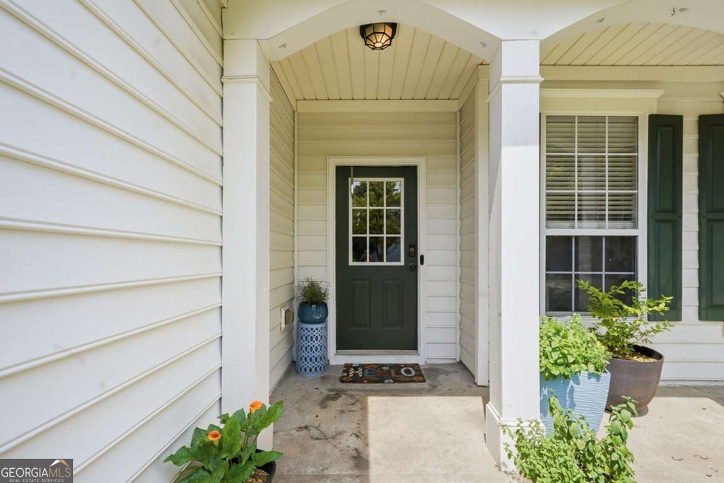 Photo of 406 Cobalt Valley Lane, Canton, GA 30114 (MLS # 10778407)