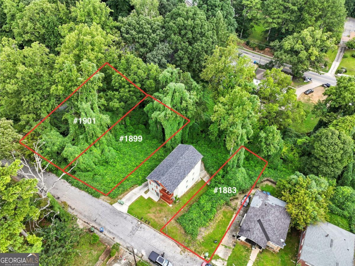 Prime Build Opportunity in Grove Park Steps from Atlanta's Growth Corridor . Unlock the potential of this prime lot in Grove Park, a vibrant and rapidly evolving neighborhood in Northwest Atlanta. Perfectly positioned inside the perimeter, Grove Park is bordered by Center Hill, Dixie Hills, West Lake, and Hunter Hills placing you at the heart of connection and convenience. From your doorstep, you're just minutes from some of Atlanta's most exciting destinations: Westside Park at Bellwood Quarry, the BeltLine Westside Trail, Mercedes-Benz Stadium, State Farm Arena, Georgia Tech, and Downtown Atlanta. The neighborhood is also near the Westside Reservoir Park, The Works ATL, West Midtown's dining scene, Atlanta's cultural arts centers, and future mixed-use developments transforming the Westside into a top-tier destination for living, working, and playing. Whether you're building a dream home, a short-term rental property, or a long-term investment, this lot offers unmatched access to parks, trails, sports, entertainment, and some of the fastest-growing real estate in the city.