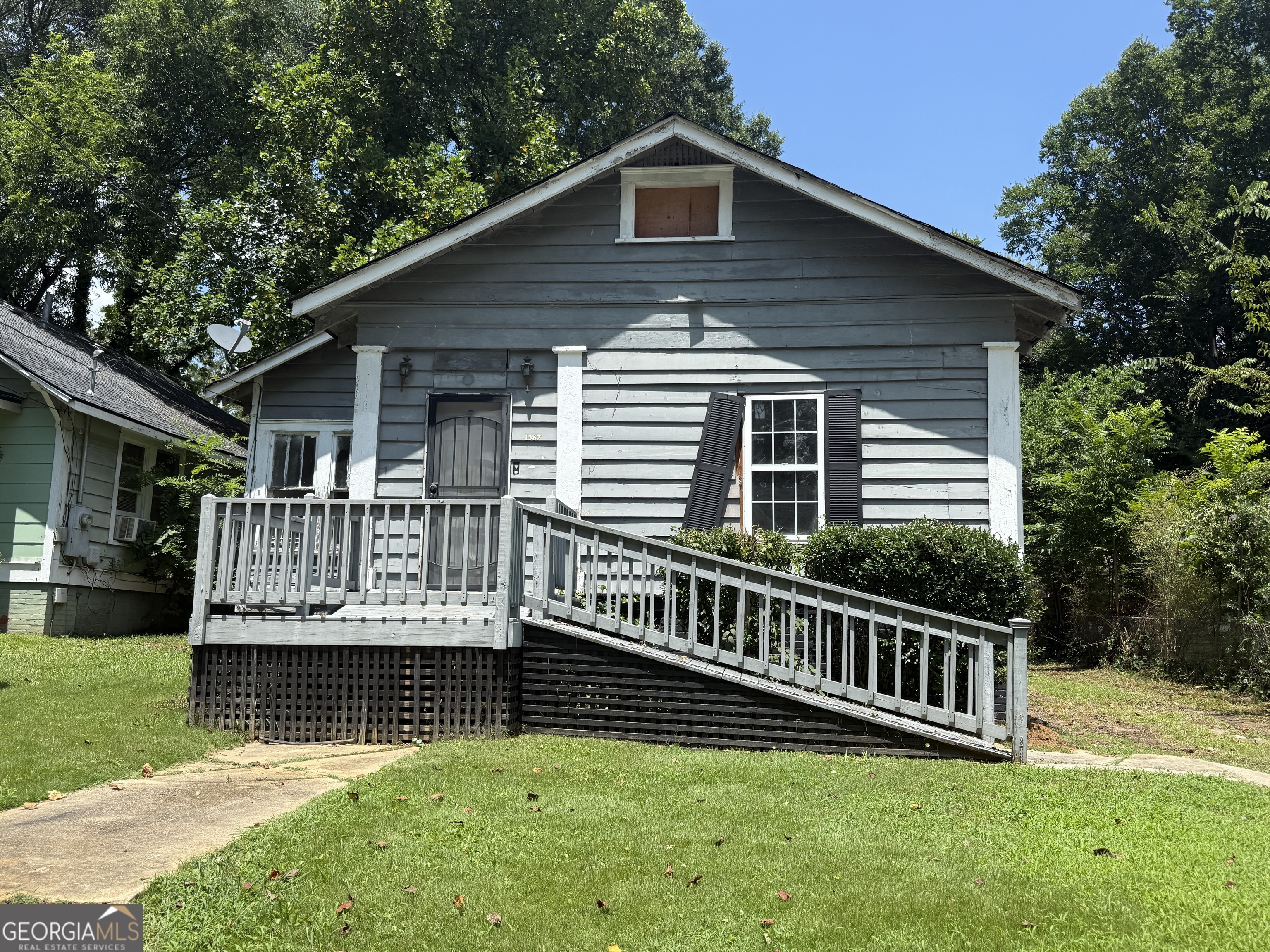 This 3-bedroom, 2-bath single-story home offers a fantastic chance to create your dream space or add to your investment portfolio. Featuring a welcoming front porch, spacious back deck, and tons of potential, this property is ready for your personal touch. With some TLC, this could be a gem. Don't wait schedule your showing today