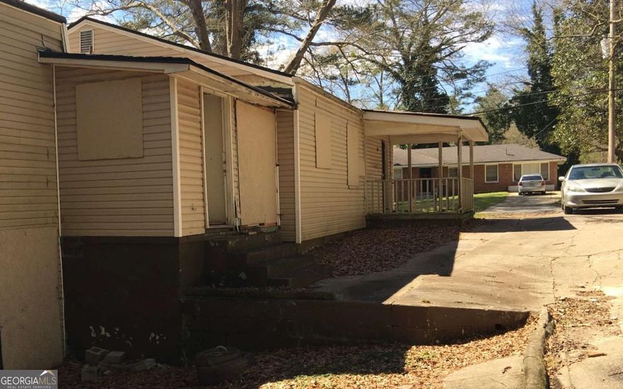 Don't miss out on the opportunity to renovate a grandfathered duplex in a highly sought after neighborhood of Atlanta. The alley on the left allows easy access to the back with opportunity for easy parking, and space to add an ADU. It gets better. This property is in a federal opportunity zone. There are tax advantages for investing in federal opportunity zone. However, most homes in the area are either renovated or new constructions.