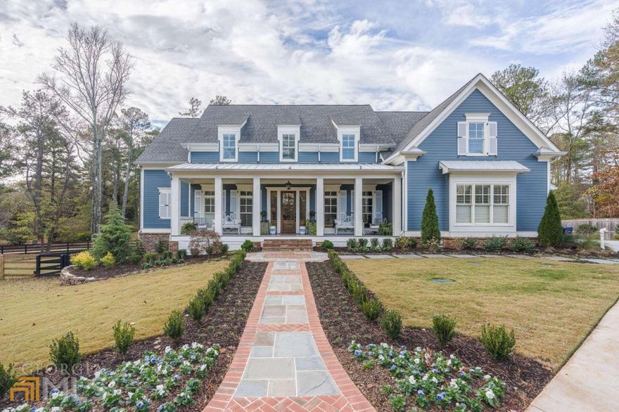 Stunning home nestled quietly on a meticulously landscaped 1 acre lot situated minutes from downtown Roswell and downtown Crabapple. This better than new home features an ownerCOs suite on the main and an ownerCOs suite on the second floor. Upon entering the home, you are greeted with a spacious foyer that opens up to the large family room with views to the covered back deck and sweeping views of the backyard. The front of the home has a Den/formal dining with accent walls and plantation shutters. Spacious family room is adorned with wood beamed ceilings, elegant fireplace, double doors leading to deck and floor to ceiling windows that floods the space with natural lighting. Chef kitchen is a dream to cook and entertain in. Elegant causal dinning fits all your small or large gathering needs. Situated of the kitchen is a cozy keeping room with fireplace with shiplap walls and vaulted beamed ceilings. Tranquil owner's suite with trey ceilings. Ensuite features free standing tub, walk in shower and 2 large walk-in closets. 2nd floor features open loft space, office space, media room, 2nd owner's suite and 2 additional large bedrooms. All bedrooms have large walk-in closets and private ensuites. Full daylight basement with separate HVAC installed, ready to finish. Covered back deck has brick wood burning fireplace with ample seating area, separate dining area, and also an uncovered area perfect for your grill. Relax under the covered deck with views to beautifully landscaped yard and inground gunite heated salt water pool with expansive stone patio. Pool installed by Neptune pools and professionally landscaped by Scapes. Feel at home with this elegantly maintained home. Don't let this home slip away! A Must see!!