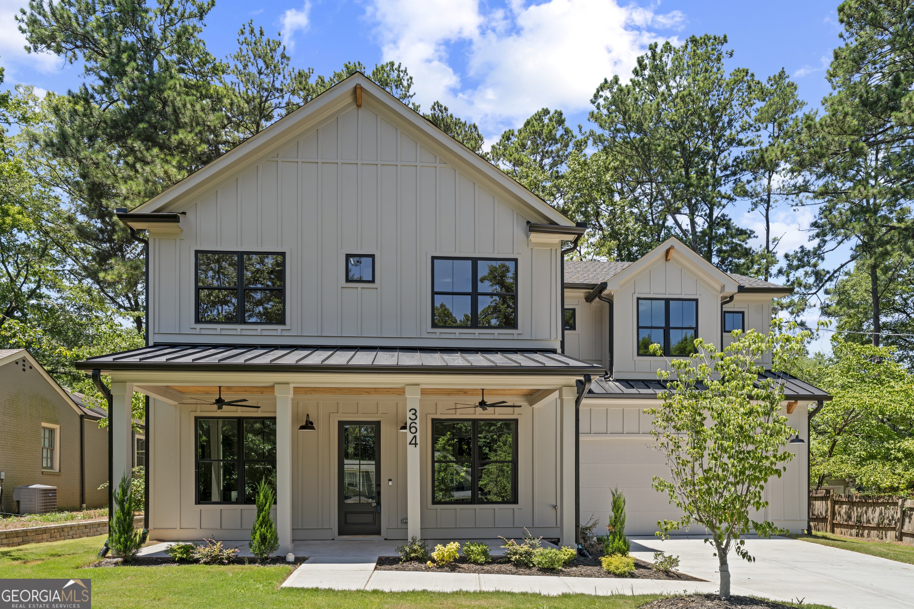 Amazing new construction minutes from Emory University, Emory Medical System, Downtown Decatur, shopping, restaurants, retail, workout and even Comet Bowling! This gorgeous new construction home offers great space, open floor plan and spectacular finishes. Impressive 5br/4.5ba also features a large bonus upstairs loft and a huge attached two-car garage off a super-functional mudroom. Designer open kitchen features expansive island, custom vent hood, 36" gas range, full pantry/butler's pantry combo, undercabinet lighting and a sunny sitting room/breakfast room. Gracious family room with fireplace & built-ins overlooks the back patio with fireplace and two tiered, fenced backyard. Main-level bedroom with private full bath. Upstairs, find an impressive owner's suite featuring a distinctive accent wall, an exceptional bath and impressive dual walk-in closets. Upstairs has three additional sun-drenched bedrooms, two bathrooms and an amazing open bonus loft space! Designer light fixtures, tastefully accented walls, tile and trim details throughout. Rocking-chair front porch in a great quiet neighborhood make this home spectacular!