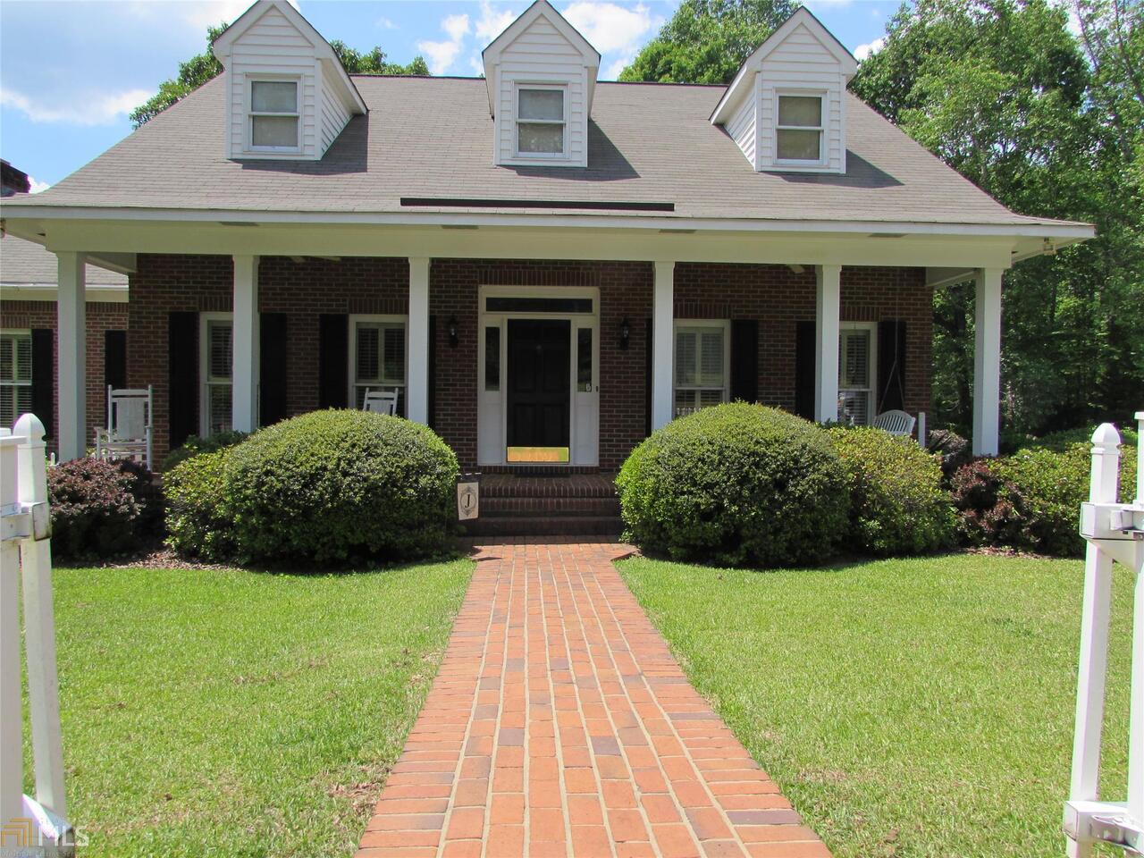 Beautifully kept 3 bedroom on 3.57 acres. Sunroom, formal dining room, many great features in this one. Convenient to Macon, Forsyth, Barnesville. Must see!! Great storage in home.
