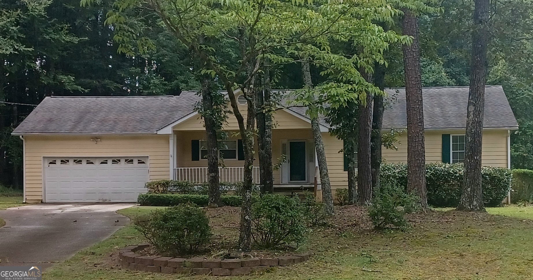 DON'T MISS THIS 3 BEDROOM, 2 BATH HOME Located in Highly Sought After Quiet Neighborhood in Sharpsburg with NO HOA. Inside the home you will find a living room with a fully functional fireplace. The large deck will be the perfect spot to relax overlooking the large back yard with large storage building. The home's location offers quick access to Peachtree City, Newnan and I-85! The home is waiting for your special touch! This property has a long driveway in this established neighborhood with mature trees, greenery, and a large front porch. The master on the main floor offers a bath complete with a tub and separate shower. Two additional bedrooms share a full bath with a tub/shower combo. The property has a spacious two-car garage. Shopping and dining at The Avenue in Peachtree City is a short 10 minute drive. Historic downtown Newnan is a 20 minute drive. Line Creek Nature Area is an 8 minute drive.