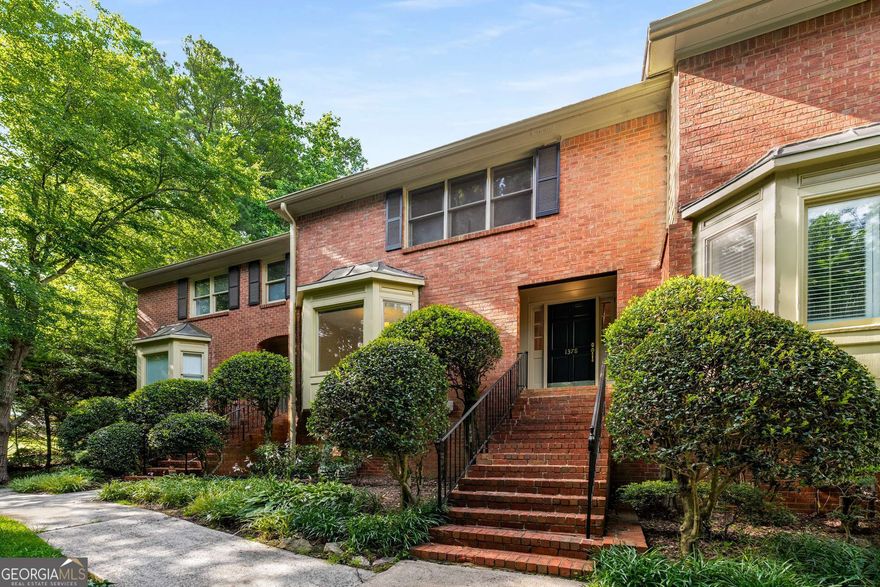 Community and convenience meet at Sheffield Glen townhomes. You may have passed the front gates many times without realizing there's a tucked-away community of long-time residents enjoying a peaceful retreat from the city-plus low monthly HOAs.  This particular unit is nestled deeper into the community, away from Briarcliff Road, and is one of the coveted North-South facing homes, which means natural light pours into both the main and upper levels throughout the day-offering warmth, brightness, and tranquility.  Highlights include: a private front entrance with a welcoming foyer; a spacious living/dining combo anchored by a gas log fireplace; and a covered back porch with skylights that span the width of the home-perfect for indoor/outdoor living. The eat-in kitchen features charming bay windows, while the large finished basement adds versatility to suit your lifestyle.  Freshly painted interiors and crown molding add subtle elegance, while providing a clean, neutral backdrop for your artwork and personal touches. The kitchen counters and bathroom vanities have been updated with light granite tops and mosaic tile backsplashes, adding a touch of modern.  In cooler months, swing open the French doors and let the outdoors become part of your living space. The primary suite includes two separate closets, while both secondary bedrooms offer generous space and flexibility. The finished basement-with partial 9-foot ceilings-can easily serve as a home office, gym, yoga studio, or media room.  Enjoy a 2-car garage with extra storage, and if you prefer to skip the drive, MARTA lines 6 and 30 are nearby with service to Northlake, Toco Hills, CHOA, Emory, Cheshire Square, Inman Park/Little Five Points, and the Lindbergh MARTA station.  You're also less than a mile from retail, restaurants, and essential services. Sheffield Glen sits on the edge of Merry Hills, across from LaVista Park, and is surrounded by some of Atlanta's most desirable neighborhoods. Located in the Druid Hills school district.    Welcome home!