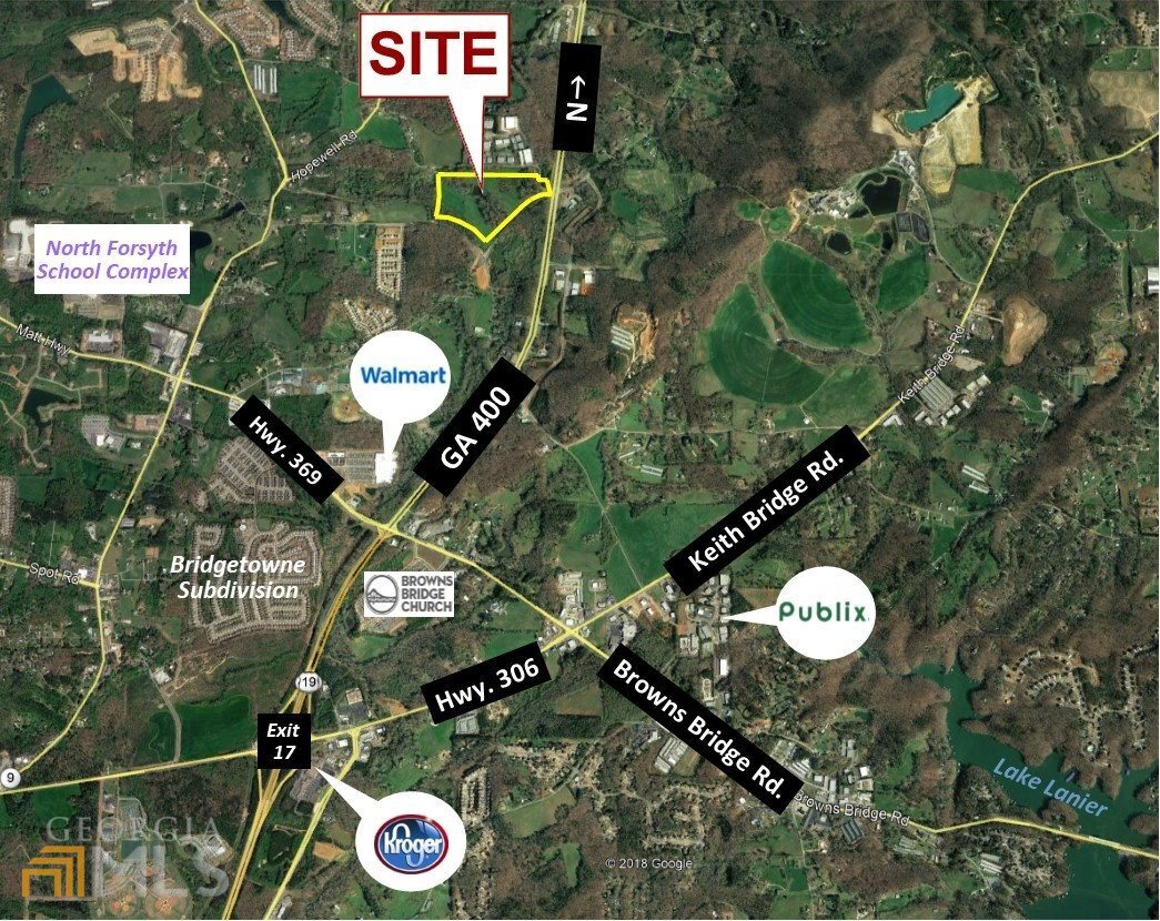 Opportunity for potential industrial/commercial development. Property is located in area of industrial development just west of GA 400 at Settingdown and Martin Roads.  Frontage on three (3) arterial roads with gentle topography.  Utilities within reasonable distance to site.