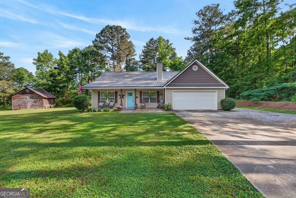 Photo of 1596 Flat Shoals Road, Concord, GA 30206 (MLS # 10768477)