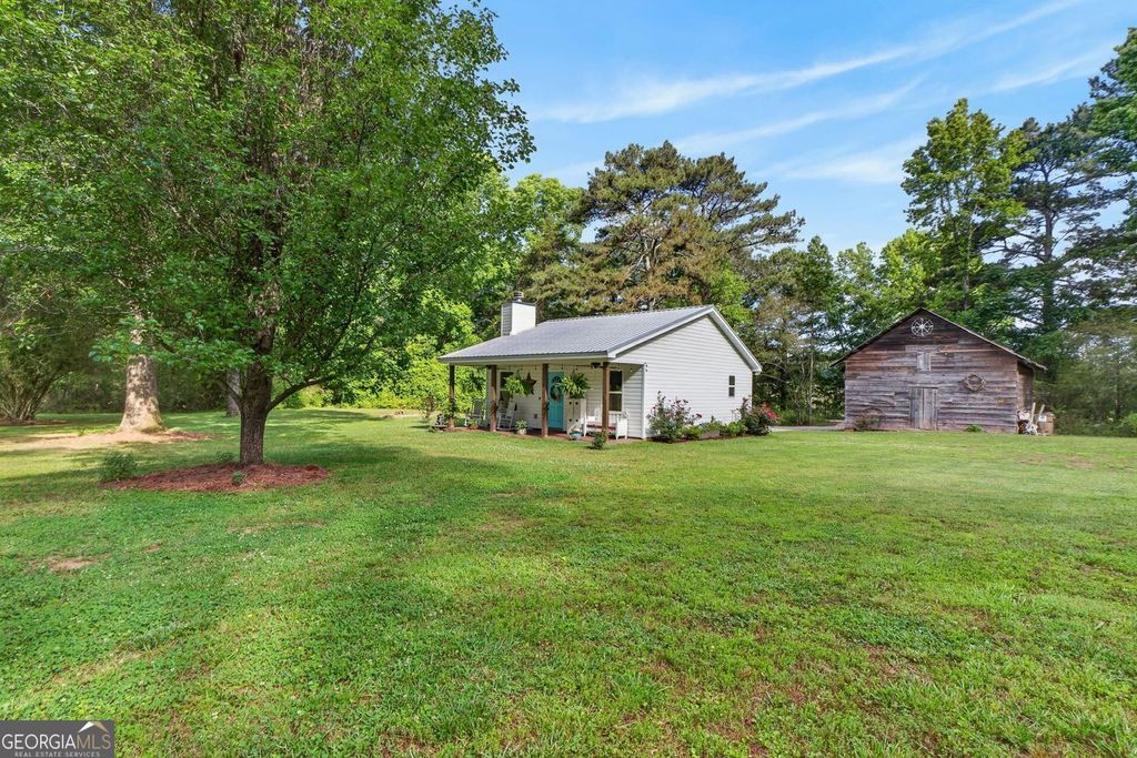 Photo of 1596 Flat Shoals Road, Concord, GA 30206 (MLS # 10768477)