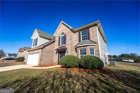 Photo of 3838 Parnell Way, Ellenwood, GA 30294 (MLS # 10671435)