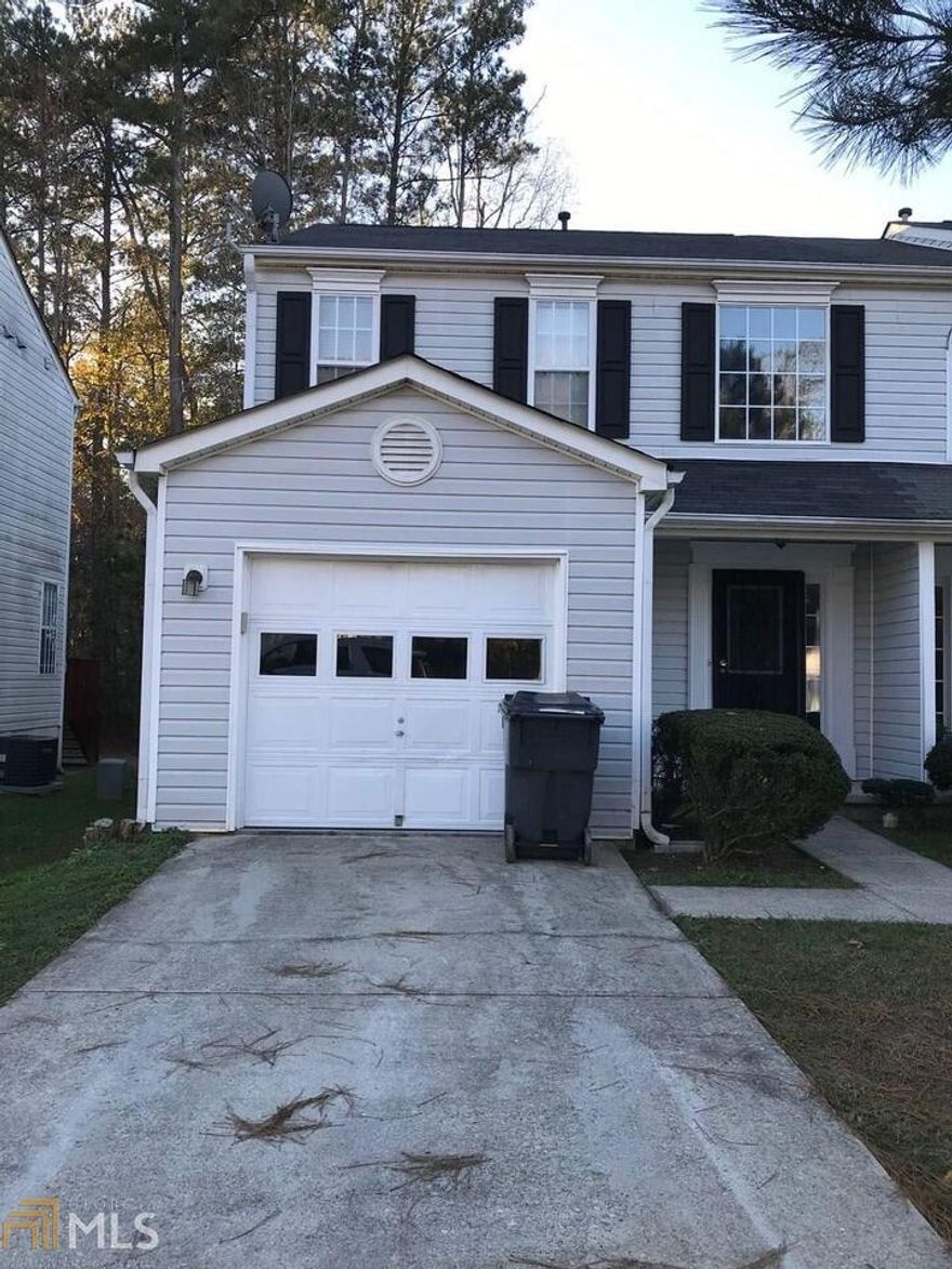 Move in ready townhome featuring luxury vinyl flooring, new light fixtures, granite countertops, stainless steel appliances with view to family room, roommate floor plan upstairs features 2 full size bedrooms with private bathrooms. Maintenance free vinyl siding, new HVAC system, this home is move in ready.
