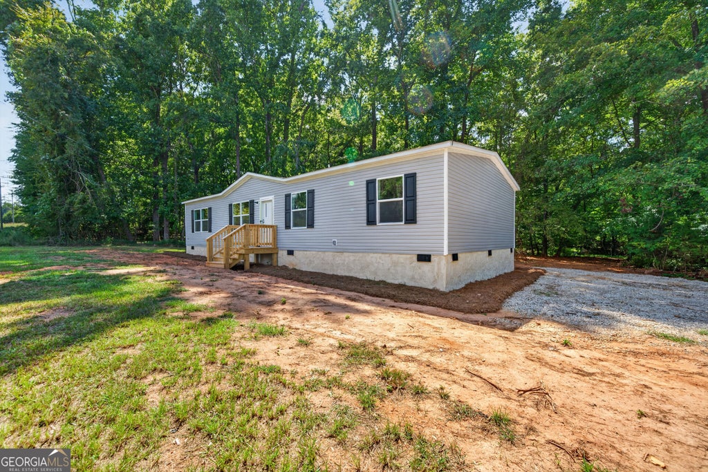 Photo of 399 McCullar Weaver Road SW, Milledgeville, GA 31061 (MLS # 10841364)