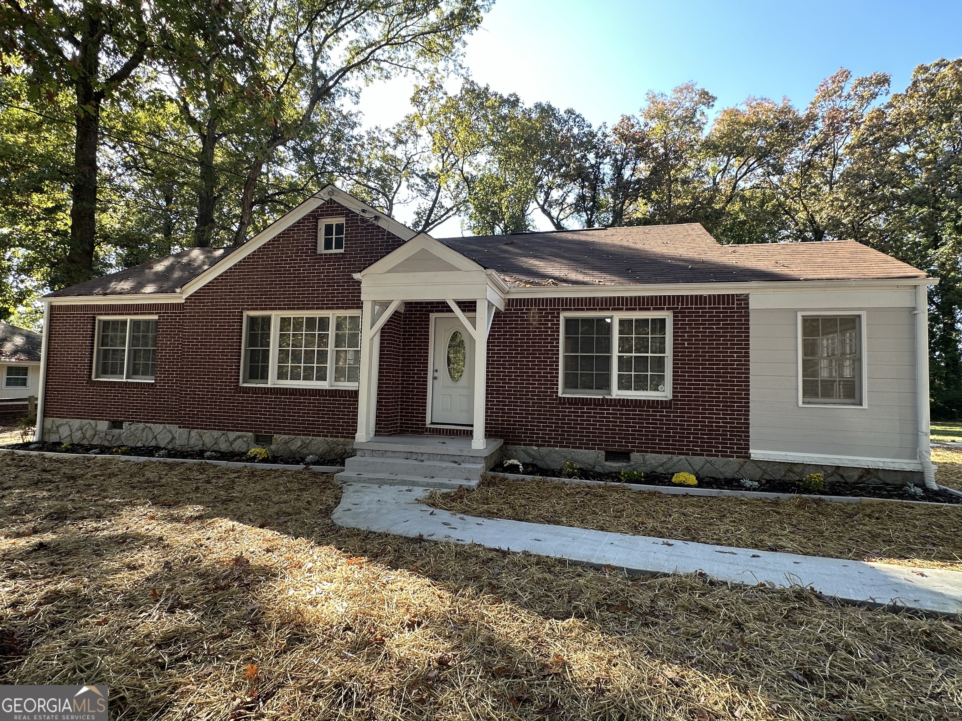 This beautifully renovated residential property is at a location that is ideal for an office or business. The property is located just off a major exit and on the Marta bus line,it's also close to shopping. The renovations includes, refinished hardwood floors, fresh interior and exterior paint, ceramic tile flooring in kitchen, new carpeting in den and family room, new wheelchair ramp. New Stove will be installed prior to closing. The roof is under 3 years old and the well maintained HVAC system if under 3 years old. For showing instructions text or call (470)687-9474.