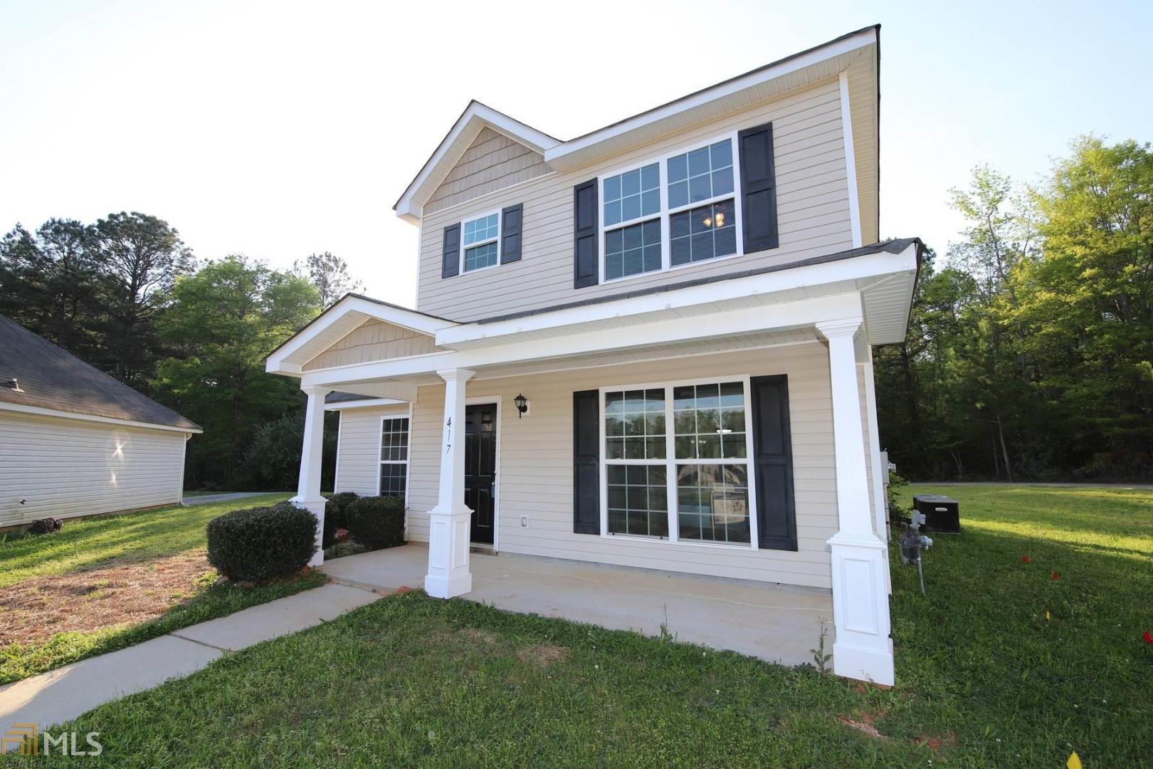 BETTER THAN NEW! This 4 bedroom, 2.5 bathroom home in Villages at Huntcliff has been remodeled from top to bottom and features many outstanding upgrades including all new floors, all new interior paint, and a completely new open kitchen with new soft-close cabinetry, Stainless Steel appliances including refrigerator, range, microwave and dishwasher, and stunning granite countertops. Kitchen also features adjacent laundry room, half bath, and dining room with sliding door access to the rear patio. All bedrooms are upstairs and feature plush new carpet. All bathrooms have been remodeled with new vanities featuring granite countertops. Master Suite features walk-in closet space and private master bath with oversized vanity. Fast access to I-85 access! Call today for more information!