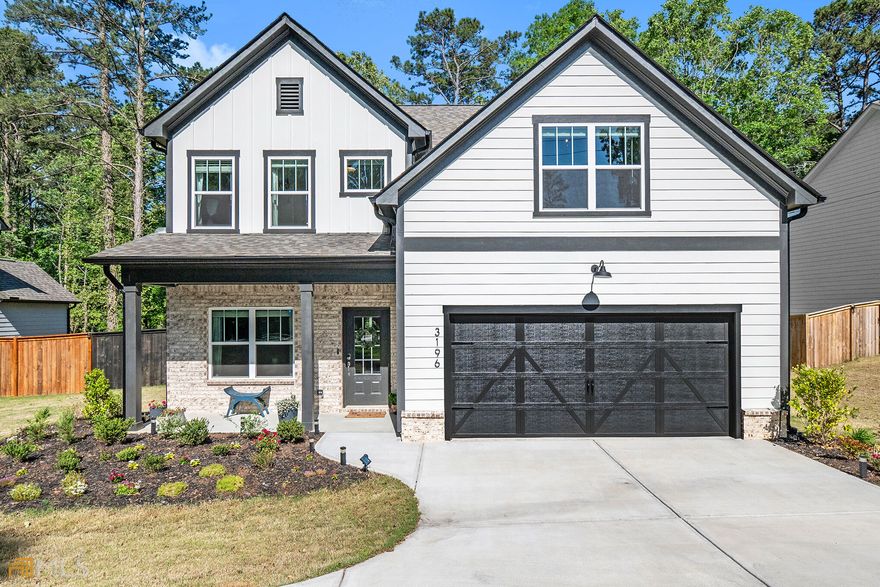 Better than new construction! Turnkey modern farmhouse craftsman with upgrades throughout! Additional recessed and pendant lighting on main floor, upgraded modern chandelier in stairwell. Fresh modern colors and meticulous details right down to upgraded door hardware and closet organization. Privacy fence, landscaping, and extended patio area in private backyard. Smart features include video doorbells, programmable climate & lighting, & remote security system. This is your chance for a stress-free new home in desirable Cobb County. Come see what all the fuss is about in this beautiful, move-in-ready home!