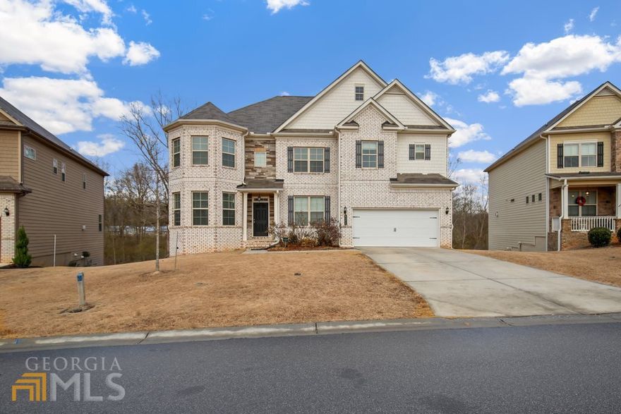 Back on Market-No Fault of Sellers. Gorgeous, Meticulously Maintained 6 Bedroom/4 bath! This move-in ready home with Bedroom and full bath on the Main Level. Freshly painted & New carpet. Step inside this Open Concept Floor Plan with Formal sitting room and dining room seats 12. Oversized kitchen with eat in breakfast area and sunroom. Enjoy morning coffee year-round in the screened porch or enjoy the grilling on the deck. Exquisite Granite counter tops, 42C White Shaker Cabinetry, stainless appliances, walk-in pantry, oversized island seats 6, Upscale lighting. Open living room, gas fireplace. Bedroom and full bath featured on the main. Huge primary suite with a sitting area, large walk-in closet, double vanities, soaking tub and large tile shower. Generous size bedrooms with plenty of closet space. Partially Finished basement with Theatre Room. Stubbed and full daylight, walk out basement.