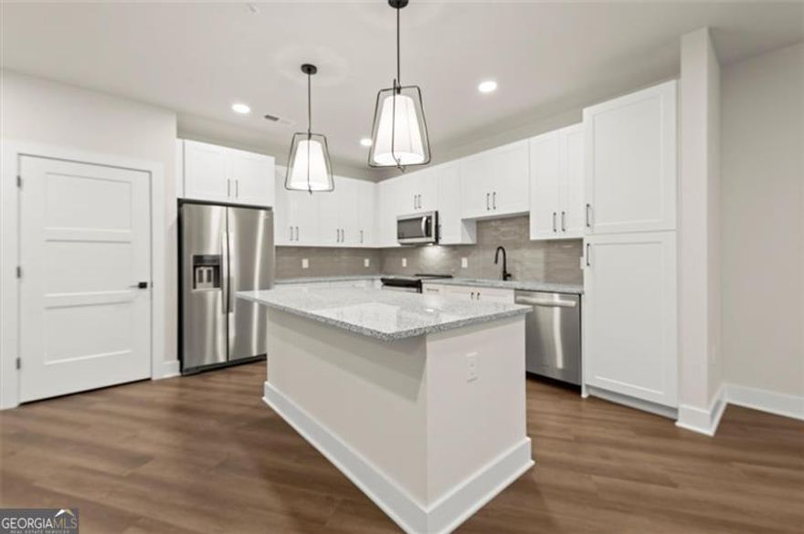 *NOW LEASING* *BRAND NEW CONSTRUCTION* *MOVE-IN SPECIALS* *55+ ACTIVE ADULT COMMUNITY.* Expand your life and start fresh at EVOQ East Cobb. This floor plan features a one bedroom, one and a half bathroom home. Discover the perfect blend of comfort, style, and community at EVOQ East Cobb, a vibrant 55 plus neighborhood designed for active adults and empty nesters ready for a fresh chapter. Nestled in beautiful Marietta, Georgia, this spacious home offers a pet-friendly garden-style setting with luxurious amenities that make every day feel special. Step inside and enjoy thoughtful features like a private balcony, high ceilings, and a full-size front-load washer and dryer, all designed to complement your lifestyle. Whether you are relaxing poolside after a water aerobics class, spending time with neighbors, or simply enjoying quiet moments at home with your furry companion, EVOQ East Cobb is where you can truly thrive. Here you will rediscover passions, explore new interests, and live life on your terms. This is more than just a place to live, this is where you belong. Ready to make your move? Let your next chapter begin at EVOQ East Cobb. Photos are representative of model home, and not actual home. Listing address is actual address of home.