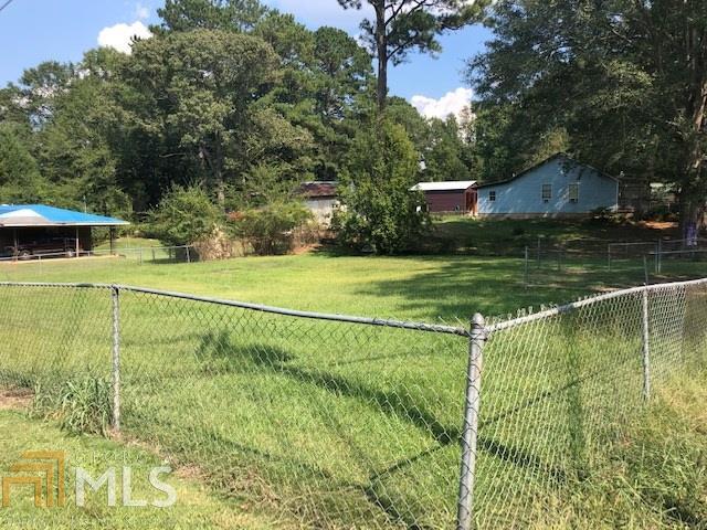 Don't miss out on this corner building Lot in Todd Addition, Has water, sewage and power. There is an older chain link fence. 100X105