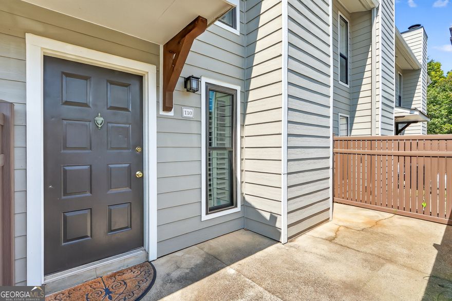 Welcome to this beautifully maintained 1-bedroom, 1.5-bath condo in one of East Cobb's most sought-after neighborhoods. Step inside and immediately feel the warmth of the open-concept living area, complete with hardwood floors, soaring ceilings, and a cozy fireplace-perfect for relaxing or entertaining. The kitchen is bright and functional, featuring crisp white cabinetry, stainless steel appliances, and plenty of counter space for cooking or gathering with friends.  The spacious bedroom offers a private en-suite bathroom and a walk-in closet, while an additional half bath provides convenience for guests and everyday living. Outside, enjoy your own private front courtyard-a peaceful retreat for morning coffee or evening unwinding.  This home also offers community amenities designed for both relaxation and recreation, including a sparkling swimming pool and well-kept tennis courts. All of this is located just a short stroll from shopping, dining, and local conveniences, with easy access to major highways and, of course, the award-winning Walton High School district. Combining comfort, style, and an unbeatable East Cobb location, this condo is a rare opportunity to own in a community that truly feels like home.