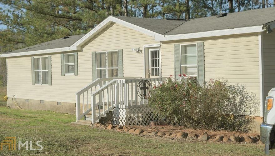This Spacious 1999 double wide Palm Harbour mobile home 1647 sq ft. with walls 2x6 double insulated on 2 acres. It comes with a beautiful view of the sunset just over the mountains. It features a split plan of 3 bedrooms and 2 baths. This property is to be sold with 1738 Upper Cove Rd. gamls 8763010.