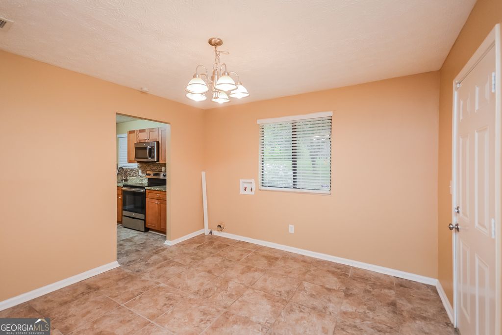 Photo of 1912 Singer Way, Lithonia, GA 30058 (MLS # 10662113)