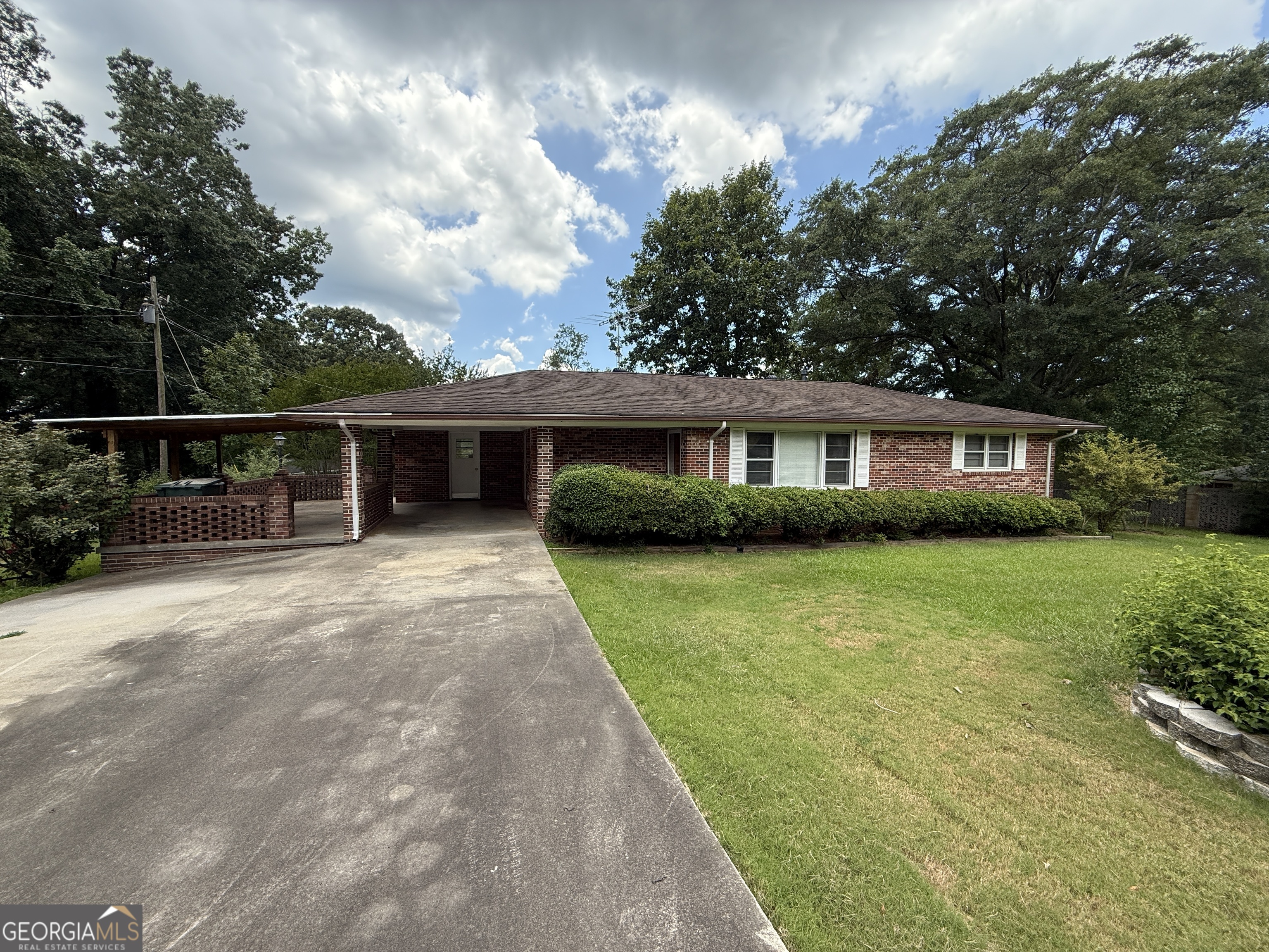 Beautiful corner lot in established neighborhood! Don't miss this well landscaped, and well maintained 2 bedroom, 1 bathroom home that is convenient to everything. The fully fenced backyard has large outbuilding for extra storage or workshop. This home has been lovingly cared for, and is ready for its next family or investor. This is a no step, 4 side brick ranch in a beautiful neighborhood that even has its own mature pecan trees. Home is being sold as is.