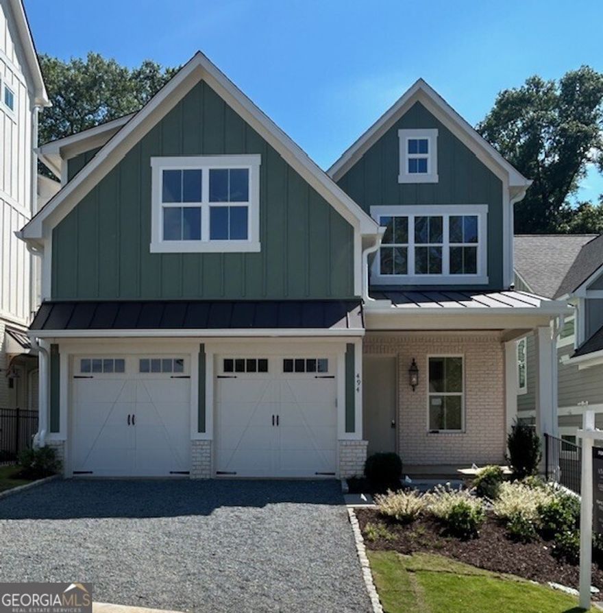 ****Seller is offering a 2/1 rate buydown with use of preferred lender.*** This luxurious new home is the epitome of modern living in historic downtown Marietta. Perfectly situated near upscale dining, chic wine bars, boutique shopping, and year-round seasonal festivals, this property offers the best of city living with a charming suburban feel. Boasting 4 spacious bedrooms, 3 full baths, a large flex room that could serve as a 5th bedroom, and dedicated office space, this home is designed with functionality and style in mind. The gourmet kitchen is truly the heart of the home, featuring top-of-the-line appliances such as a Sub-Zero refrigerator, Wolf gas range, Bosch dishwasher, and a Sharp microwave in addition to stone countertops and custom soft-close inlaid door cabinetry. Entertain effortlessly with a dedicated wet bar complete with a built-in beverage refrigerator and a large prep island with open views to the family room featuring a gorgeous fireplace, eat-in kitchen, and outdoor covered patio. Beautiful 5" plank, site-finished hardwoods run throughout both the main level and upstairs. The primary bedroom suite is a sanctuary of its own, offering abundant natural light, an oversized spa-like bathroom with a dual vanity, a free-standing soaking tub, a frameless glass shower, vaulted ceilings and a spacious walk-in closet with direct access to the laundry room for added convenience. On the main level, you'll find a guest bedroom perfect for visitors, while upstairs are two additional bedrooms and a bonus room ideal for a media room, playroom or an additional bedroom. Enjoy the outdoors year-round on the covered back patio with a large fireplace. Built with exceptional attention to detail, this home features a 30-year architectural roof, a tankless hot water heater, spray foam insulation, and rounded wall corners, ensuring both beauty and efficiency. Don't miss your chance to own this high-end masterpiece - schedule a tour today before it's too late!