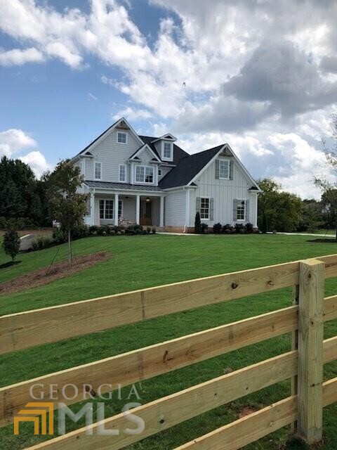 Incredible new construction Farmhouse Community, Features an 18 lot pasture Setting neighborhood with street lined split rail fencing + tree lined. This stunner boasts the primary bedroom on the main as well as an additional bedroom on the main. Featuring designer finishes, Huge Owner's Suite on main, spa bath, bright kitchen with beautiful cabinetry, soft close drawers, super open plan, covered porches overlooking the front and backyard. Daylight, partially finished, basement to include a Spacious bedroom, Full bath, walk-in closet, theater room/gym, and recreational room, to level backyard that's ready for a future pool.