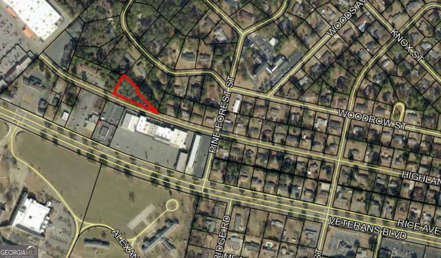 Land is approved for 6 townhouse apartments.