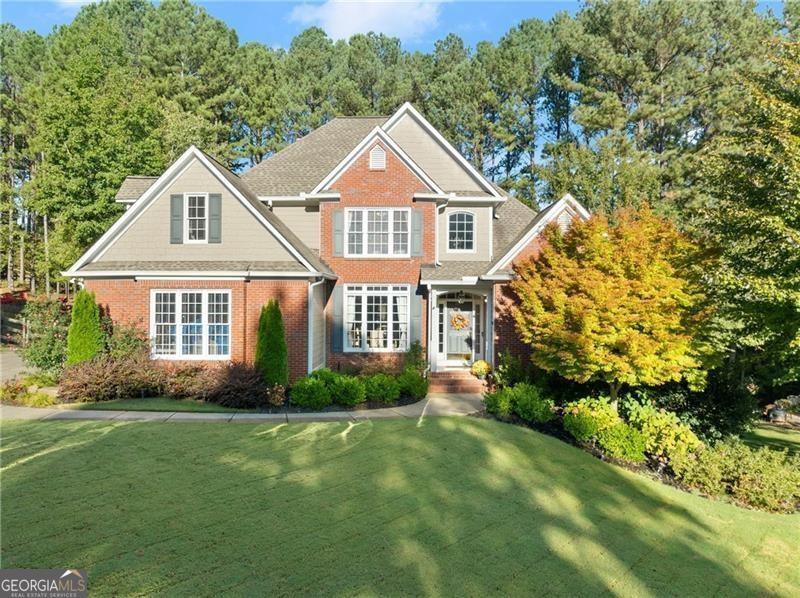 Welcome to this beautifully renovated 6-bedroom, 3.5-bath home, situated in the highly desirable Bentwater golf community in Acworth. This residence boasts a spacious master bedroom on the main level with a fully renovated bathroom and an impressive addition - a fully enclosed back porch equipped with A/C, ideal for savoring morning coffee or enjoying TV evenings. Upstairs, you'll find three generously sized bedrooms and a well-appointed bath, providing plenty of space for family and guests. The basement features a large living room, an in-law style kitchen, 2 additional bedrooms, and a full gym that can serve as another bedroom, offering versatile living options. Situated on one of the best lots in the community, this home features a large backyard perfect for children and pets to play. Enjoy the fantastic amenities Bentwater has to offer, including multiple pools, tennis courts, parks, playgrounds, and scenic trails, creating endless opportunities for recreation and relaxation. Don't miss out on this incredible opportunity to make this home your own!