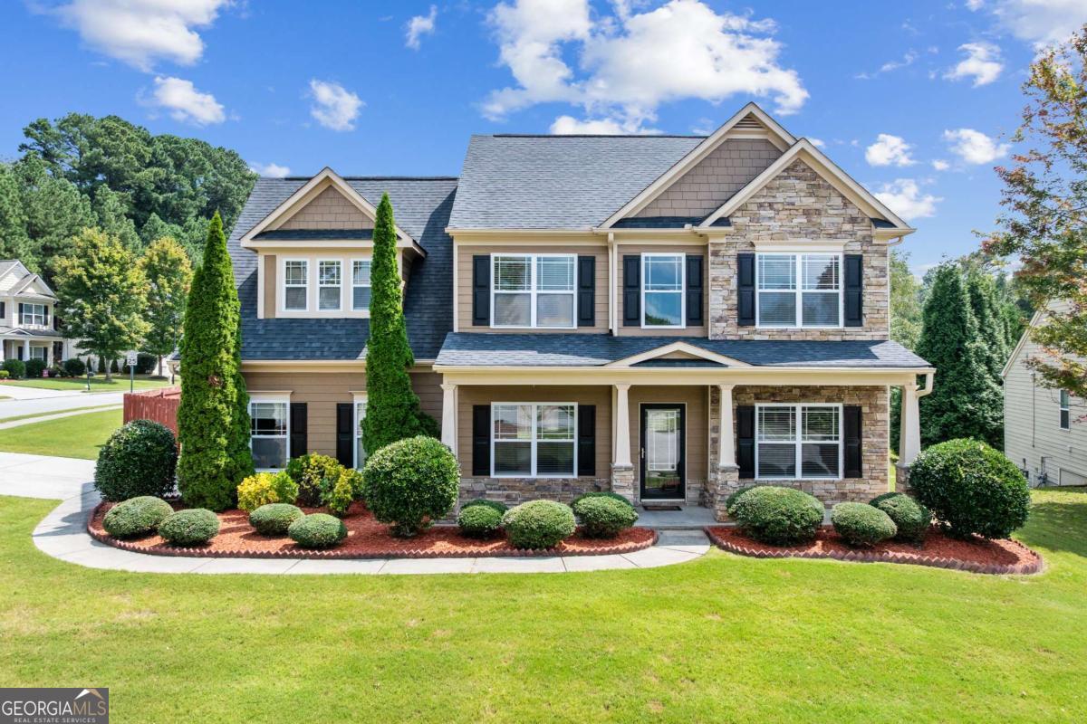 Welcome to this beautifully maintained 4-bedroom, 2.5-bath home in the heart of Buford! Nestled on a spacious corner lot in a quiet cul-de-sac, this property offers curb appeal and privacy with a large front yard and manicured landscaping. Inside, you'll find a freshly painted interior - including ceilings - that creates a bright and inviting atmosphere. The open-concept kitchen boasts new stainless steel appliances, including a cooktop, microwave, oven, and dishwasher, perfect for everyday living and entertaining. A cozy fireplace highlights the living area, while the separate dining room and flexible spaces provide room for work or play. The oversized primary suite upstairs features a walk-in closet, dual vanities, a soaking tub, and a glass shower. Located just minutes from top-rated schools, shopping at Mthe all of Georgia, restaurants, and easy access to I-85/I-985, this home balances comfort and convenience. With its updates, prime location, and cul-de-sac lot, this Buford gem is move-in ready and waiting for its next owner.