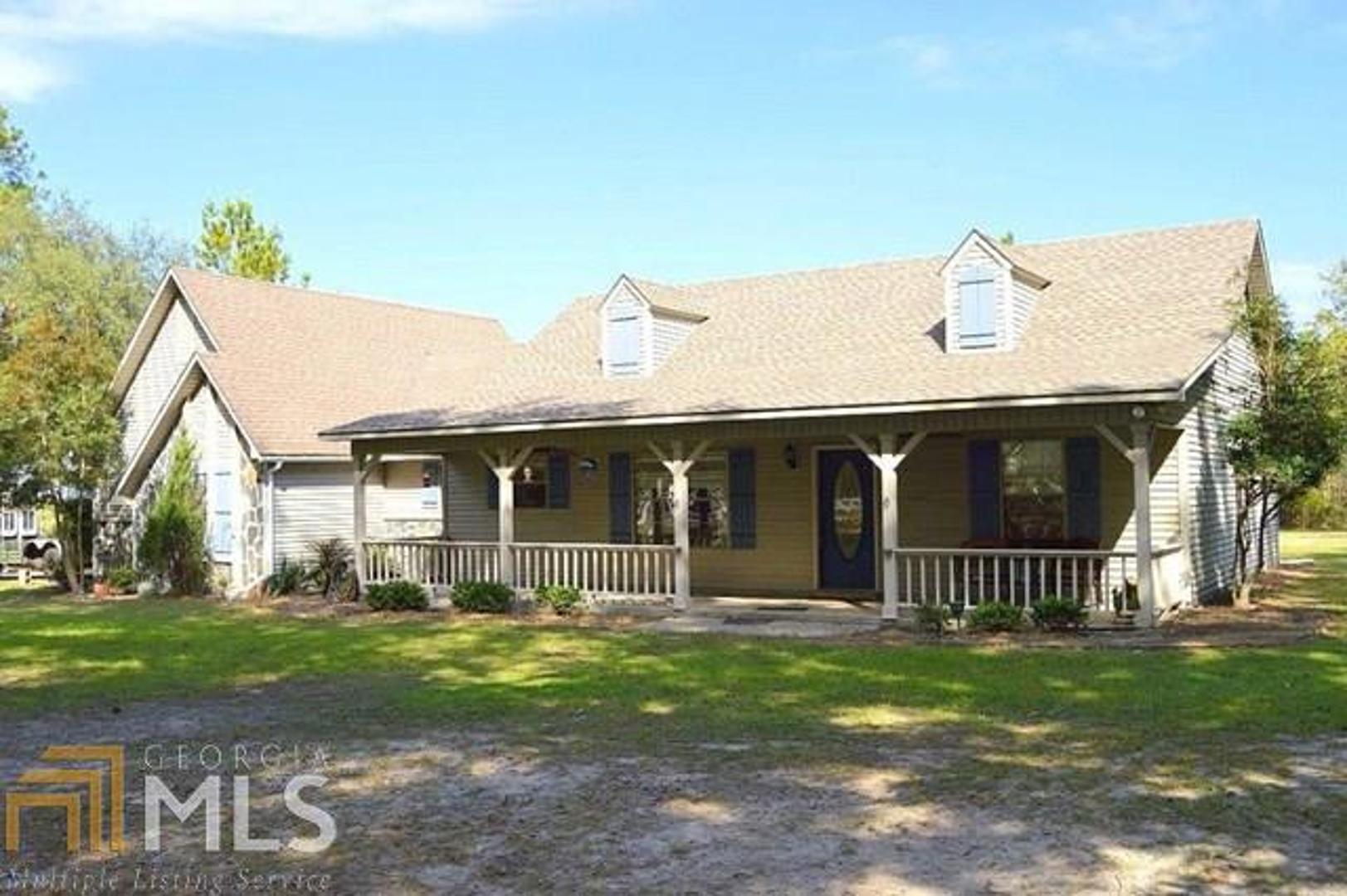 HORSES WELCOME! OVER 4 ACRES WITH A BARN, STABLES, FENCED AREA FOR HORSES, & PLENTY OF OUTDOOR STORAGE. RELAX OVERLOOKING THE MARSH IN THE OUTDOOR SWING OR ON THE SCREENED PORCH. BRING YOUR ROCKERS FOR THE FRONT PORCH AND MOVE RIGHT IN! THIS 3 BEDROOM SPLIT PLAN HOME FEATURES NEW CARPET THROUGHOUT, A SPACIOUS COUNTRY KITCHEN WITH TRASH COMPACTOR & PANTRY, INDOOR LAUNDRY MUD ROOM, OVERSIZE MASTER WITH WALK-IN CLOSET & WALK-IN SHOWER WITH DUAL SHOWER HEADS, & MORE TO LIST. THIS HOME IS READY FOR YOUR HORSES WITH 3 FINISHED STABLES, 3 PARTIALLY FINISHED STABLES, A STORAGE ROOM, STORAGE SHED, & LARGE FENCED AREA. PARTIALLY WOODED WITH GREAT TRAILS FOR RIDING. MAKE AN APPOINTMENT TO SEE TODAY EASY TO SHOW OR SEE!