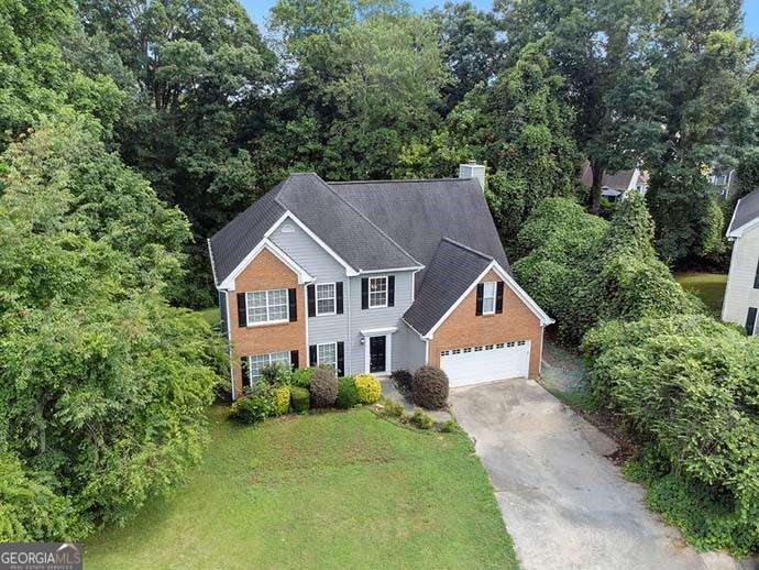 JUST LISTED. Welcome Home to this beautifully upgraded 4-bedroom, 3-bath brick-front home nestled in a quiet cul-de-sac within the highly acclaimed Chattahoochee High School District-ranked 18th out of 458 Georgia high schools (according to SchoolDigger). The spacious open floor plan offers 2838 sq ft of living space with a chef's kitchen featuring granite countertops and plenty of cabinets. Master suite offers a spacious bedroom, a walk-in closet, a double vanity, a newly updated bathroom with a free-standing bathtub, and a large bonus (office) room. The home also features a fireplace, living room, family room, breakfast dining, formal dining, and pantries, and it has a newly coated garage floor. The newly renovated master bathroom and guest bathrooms were completed in May 2025. Exterior siding painted in 2021, interior painted in July 2024. Don't miss this rare move-in-ready Alpharetta gem conveniently located within a mile of shopping, dining, a golf club, and Lake Windward. Stay tuned for more pictures as the home is being renovated, as only the special order glass doors remain to be delivered and installed within a week as of May 9th.