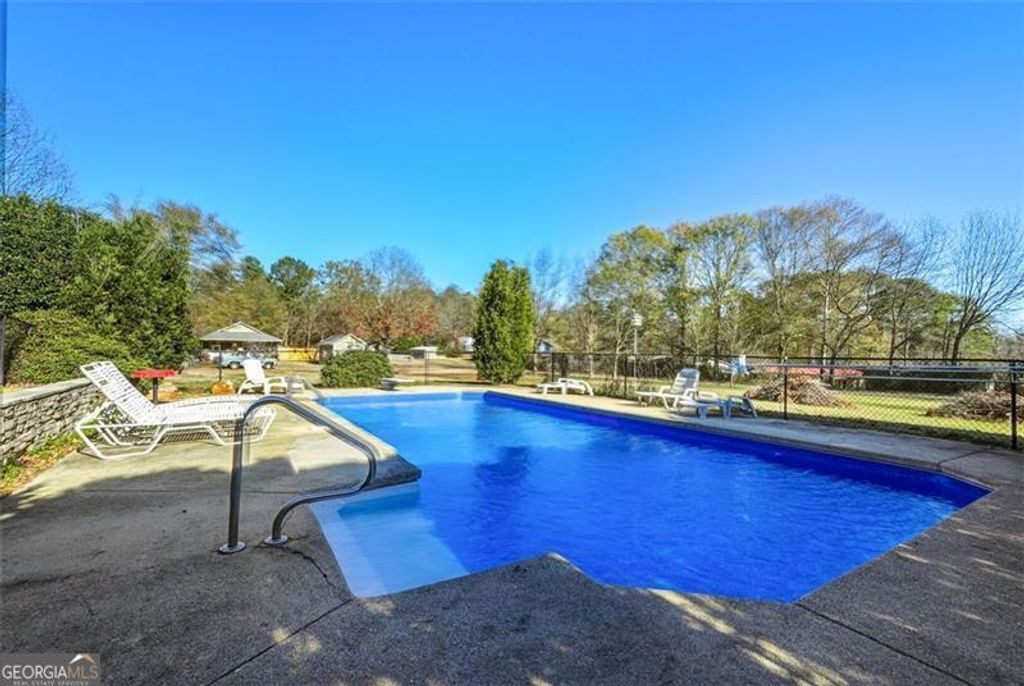 Photo of 76 Baker Rd, Cartersville, GA 30121 (MLS # 10659662)