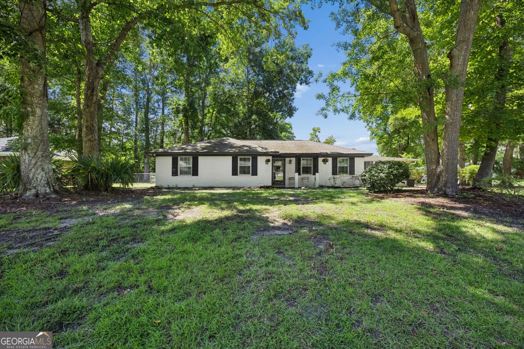 Photo of 352 Sandpiper Road, Richmond Hill, GA 31324 (MLS # 10838214)