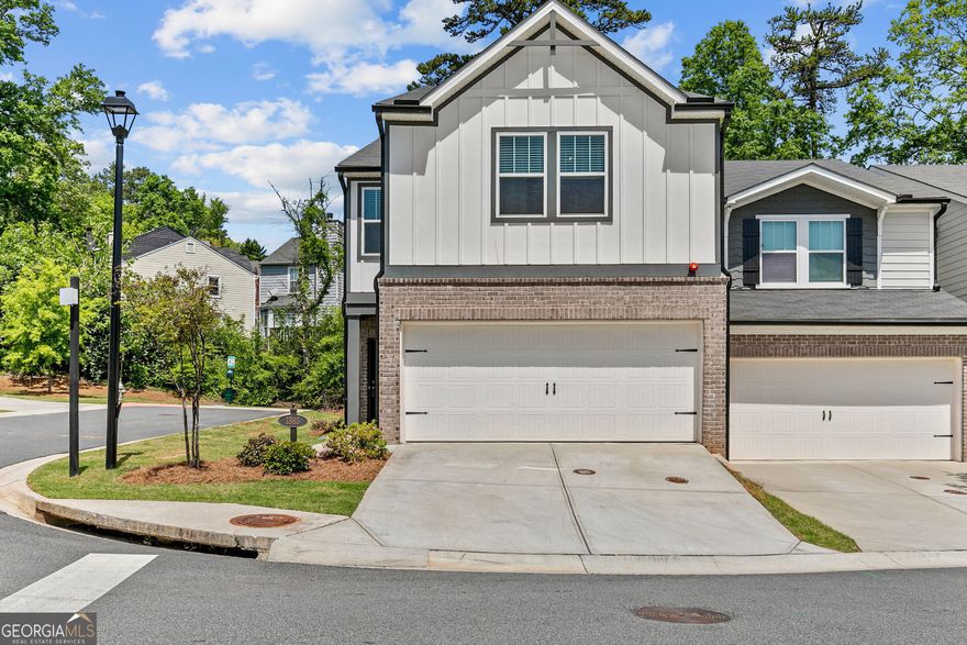 Step into style and comfort in this beautifully maintained, four-year-young end-unit townhome located in one of the area's most desirable communities! Featuring a bright, open-concept floor plan and luxury vinyl plank flooring throughout the main level, this home is designed with modern living in mind. The chef-inspired kitchen boasts granite countertops, stainless steel appliances, an oversized island with seating, a generous walk-in pantry, and ample cabinet storage-perfect for everyday living and entertaining alike. Just off the kitchen, you'll find a convenient half bath and a deep storage closet. Step outside to the private patio, ideal for grilling, relaxing, or hosting friends and family. As an end-unit, the home is filled with natural light streaming through expansive windows, creating a warm and inviting atmosphere throughout. Upstairs, plush carpeting adds comfort to the versatile loft space, great for a home office, playroom, or reading nook. The spacious primary suite offers a peaceful retreat with a walk-in closet and spa-like ensuite bath. Two additional bedrooms, each with their own closets, share a well-appointed full bath. This vibrant community offers fantastic amenities including a large dog park, playground, and firepit area-perfect for evening gatherings and making new connections. And the location? Truly unbeatable-just minutes from major highways, Kennesaw State University, local parks, popular restaurants, and everyday essentials like Costco, Whole Foods, and Target.