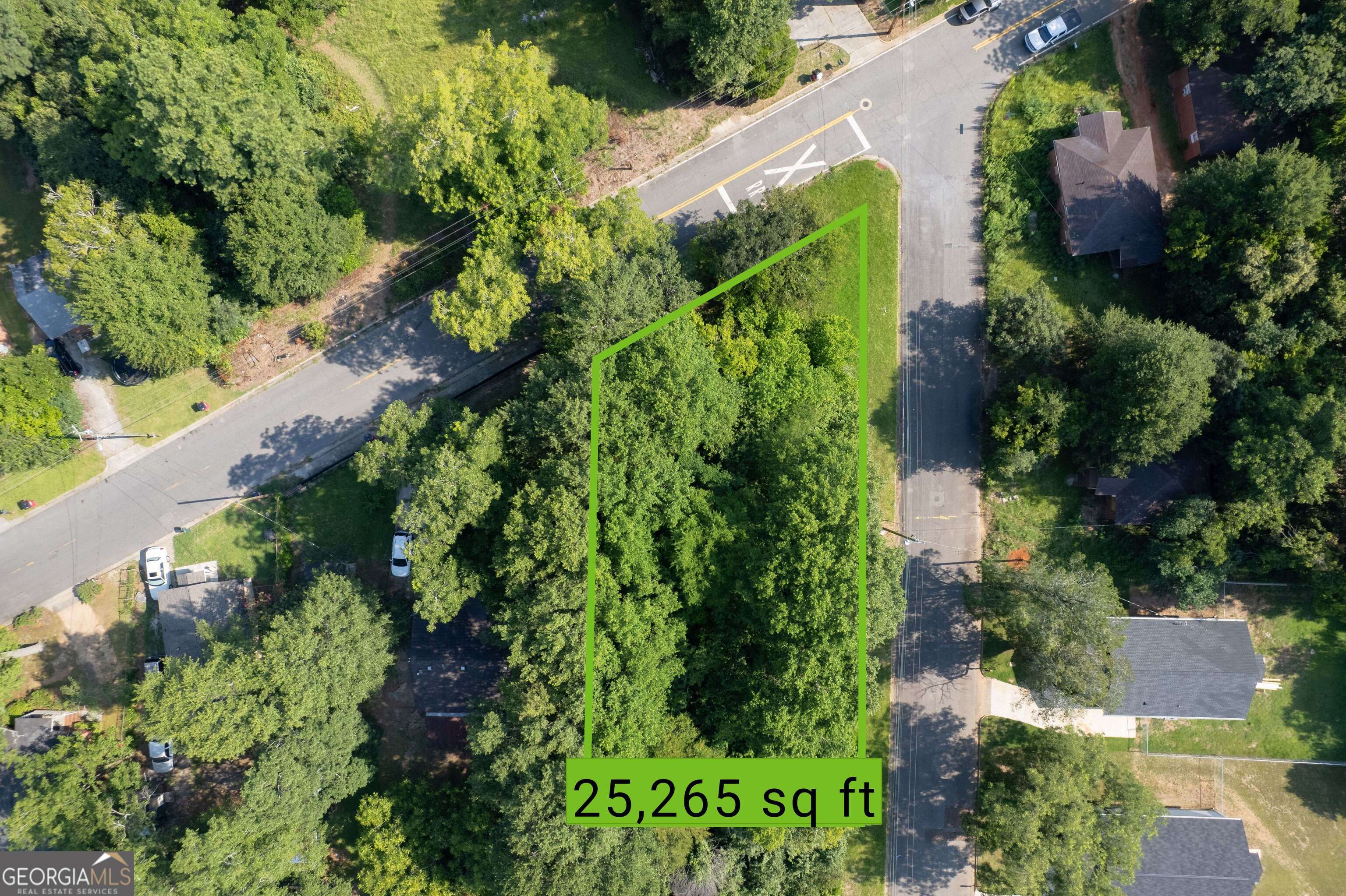 Located in the Lynmore Estates subdivision, this 0.58-acre corner lot offers a spacious setting within a residential neighborhood. The parcel sits at the intersection of Marion Avenue and Dorothy Avenue, and is zoned R-2 for residential use. Public utilities-including electricity, water, sewer, and natural gas-are available at the street. The lot spans approximately 25,265 square feet, with a depth of about 251 feet, according to public records. It is unimproved and has no existing structures, making it suitable for future development or long-term investment.