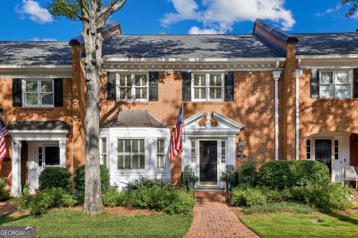 Welcome home to a simple, turnkey lifestyle in this updated townhome in the desirable Woodlands community! Thoughtfully renovated by the owner/architect, the townhome is tastefully re-imagined and move-in ready. The main floor features a large living/dining area with fireplace, updated kitchen with new appliances and a great screened porch. Also on the main floor is a large separate dining room which alternatively could be a bedroom with its newly tiled full bath. The large primary suite upstairs has a second fireplace, sitting area, new bathroom, and a re-designed space with a large walk-in closet. The secondary bedroom upstairs is also large with an office area. New, low-maintenance LVP flooring and newly tiled baths are throughout both floors The lowest level has a flex space, perfect for a workout room or TV room, and it is stubbed for a bath. So convenient and walkable to many Dunwoody shops and restaurants, this townhome community is just minutes to highways, the Perimeter area, and Roswell/Alpharetta communities.