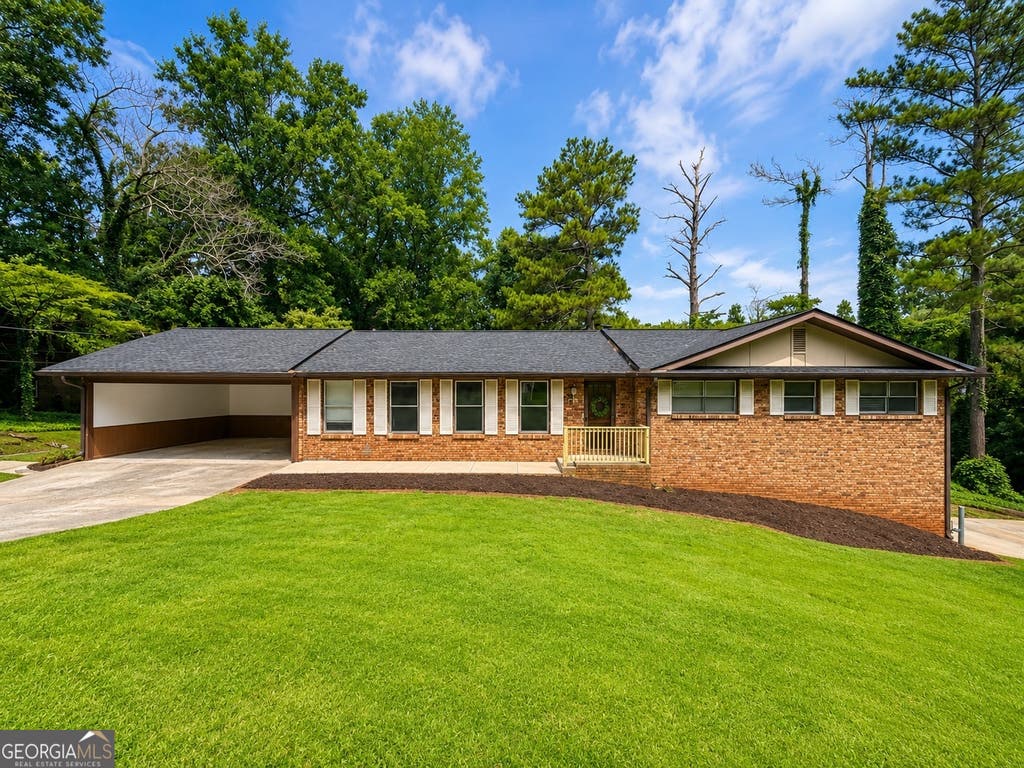 Photo of 177 Northwind Court SW, Lilburn, GA 30047 (MLS # 10813057)