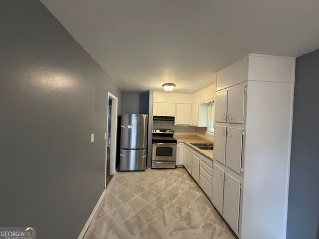 Photo of 1364 Stoneham Court, Atlanta, GA 30349 (MLS # 10662854)