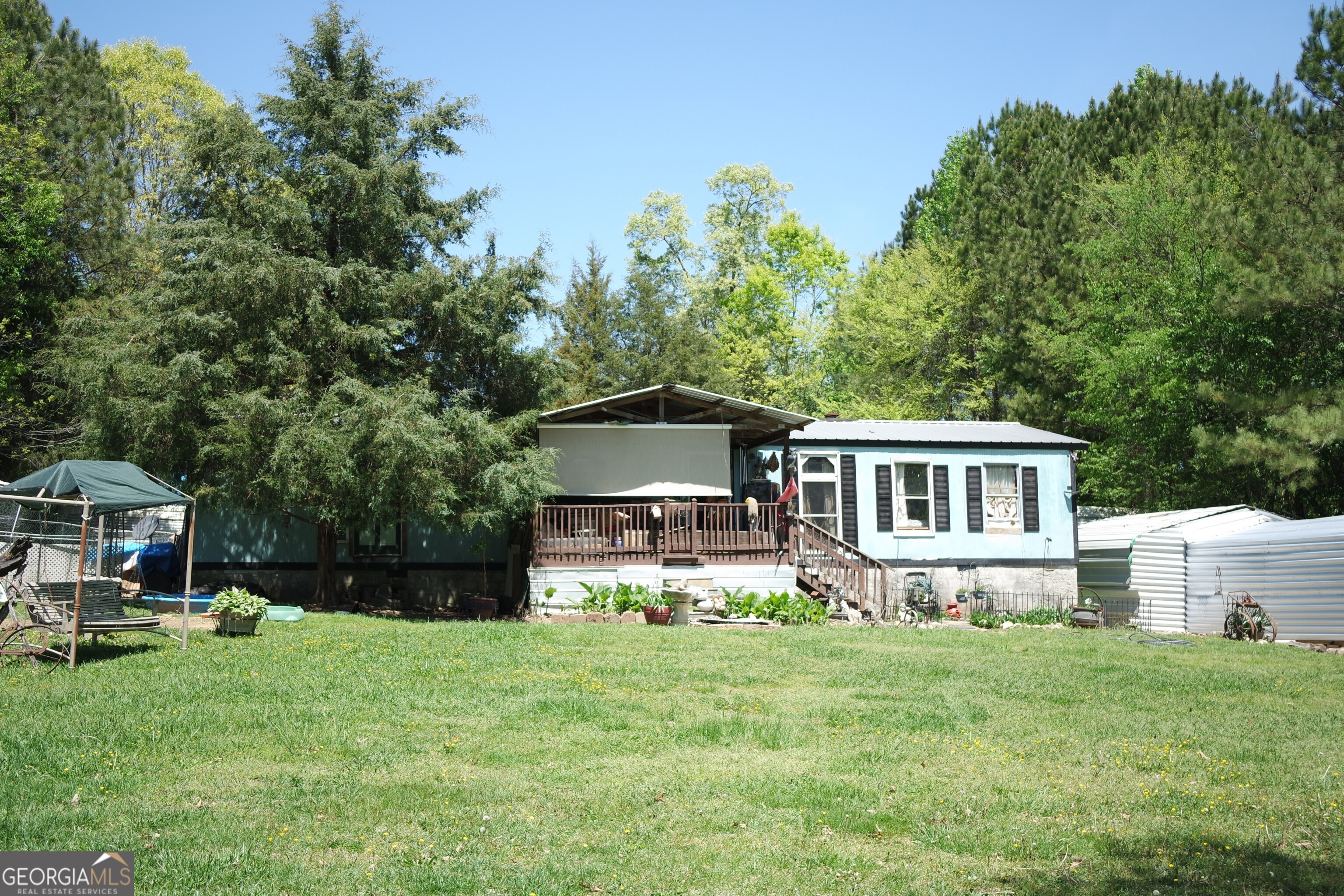 Charming Fixer Upper on a Showcase Lot with Endless Possibilities This 3-bedroom, 2-bathroom home is full of potential and ready for a fresh perspective. Whether you're a first-time buyer with a vision or an investor looking for your next project, this property offers a wonderful opportunity to create something special. While the home could benefit from thoughtful updates, the true gem is the lot itself spacious, level, and ideal for outdoor living, gardening, or future enhancements. It's the perfect backdrop to reimagine this home's full potential. Located in a peaceful setting, this property offers both charm and opportunity for those looking to add value and make it their own. Don't miss your chance to unlock the possibilities this beautiful lot has to offer.