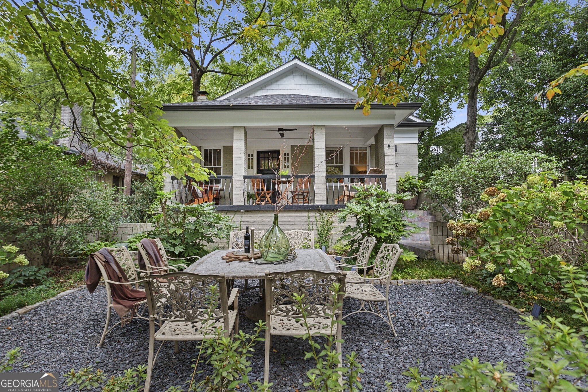 Charming FULLY FURNISHED Midtown bungalow nestled 2 blocks from Piedmont Park. Inviting covered porch entry overlooking a Tuscan-style courtyard designed for entertaining leading into the Living room with stone facade fireplace. Chef's kitchen features a DCS gas range, SubZero refrigerator, breakfast island, walk-in pantry, and separate Wet bar with built-in glass cabinetry, SubZero wine refrigerator, and Fisher and Paykel double-drawer dishwasher. The Primary suite includes 2 walk-in closets and spacious Bath with separate shower, soaking tub, dual vanity, and beautiful natural light. 3rd Bedroom currently used as an Office with pull-out sofa. Off the Kitchen, enter the fantastic private and fenced-in backyard through a cozy screened porch to a large patio terrace with DCS outdoor grill, range, and smoker along with a gas fire pit and dining area surrounded by a stunning landscape. Hardwoods and recessed lighting throughout this home with off-street parking. Unbeatable walkability to the Park, Beltline, Ponce City Market, shopping, restaurants, and many wonderful attractions Midtown has to offer. Available short or long term. Perfect home and location for the film and television Production community or Corporate relocation.