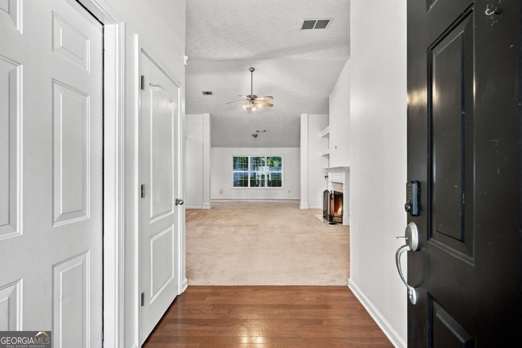 Photo of 1490 Jami Hollow Way, Lawrenceville, GA 30043 (MLS # 10846777)